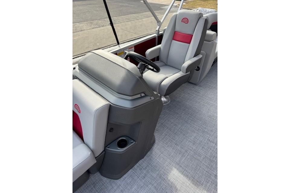 2026 Sun Tracker Party Barge 24 XP3 interior with steering console and seating.