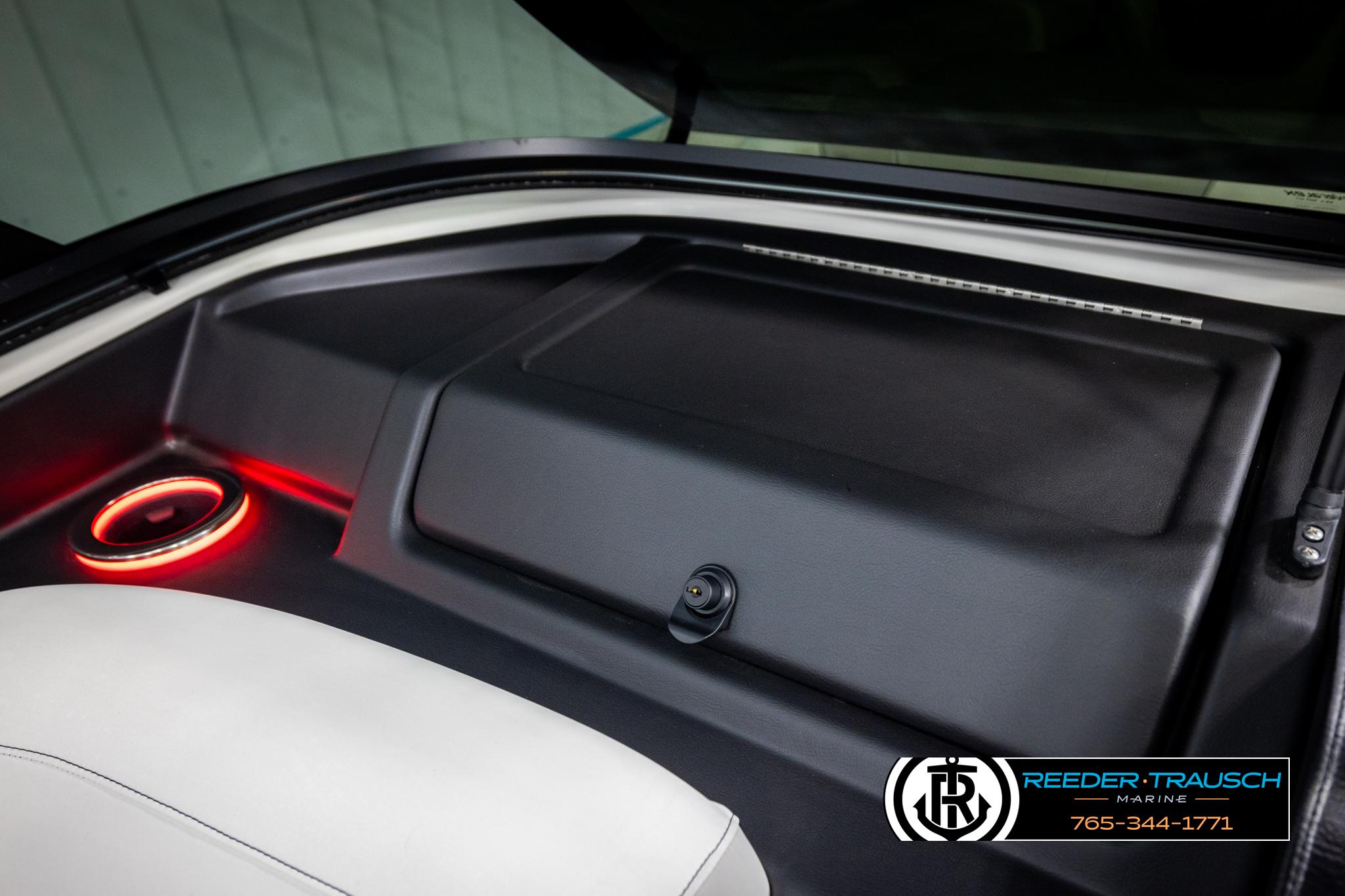 Interior of 2025 Avalon 2585 Excal VRBW with illuminated cup holder and sleek design.