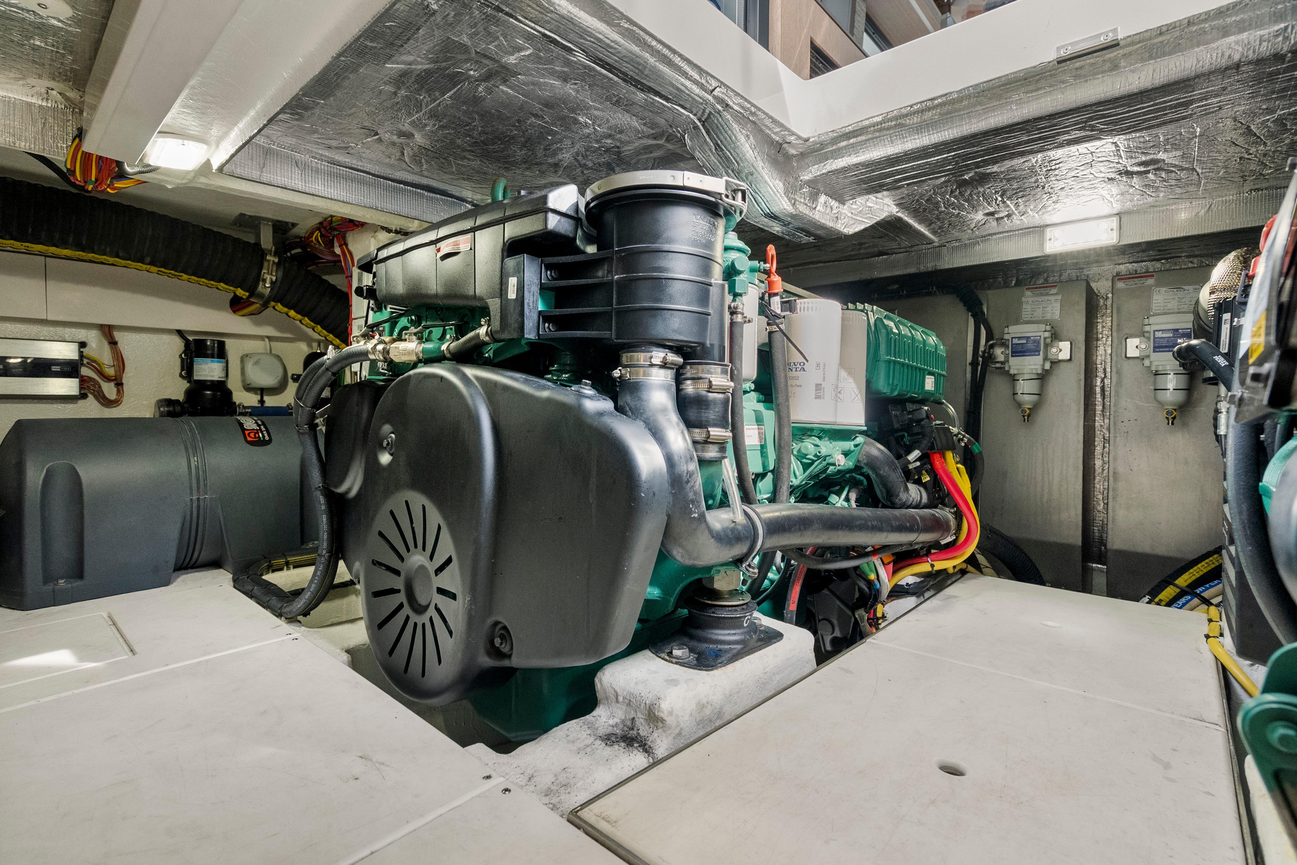 Engine room of 2023 Galeon 400 Fly yacht, showcasing advanced machinery and components.