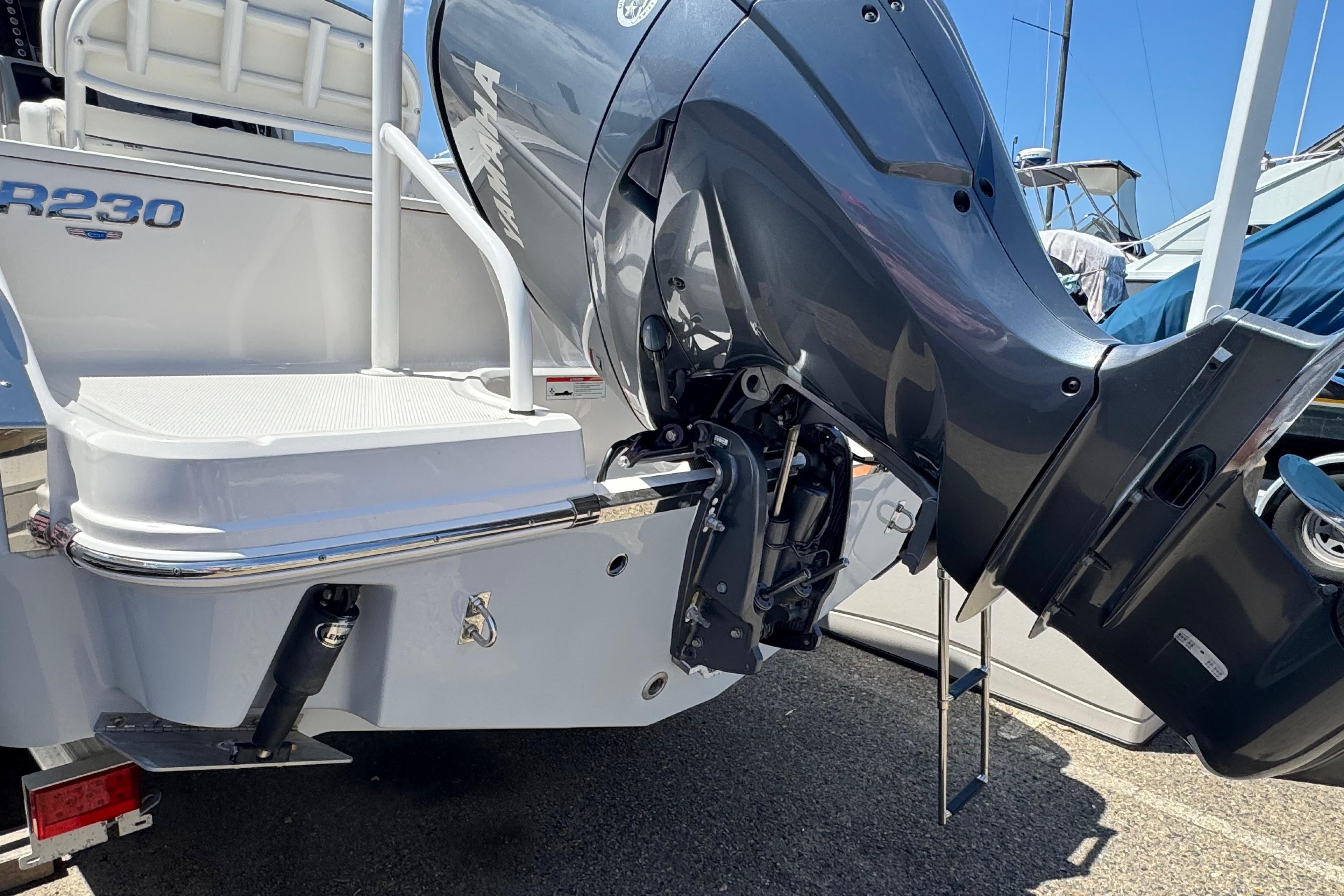 2022 Robalo R230 Center Console boat with Yamaha outboard motor, rear view.