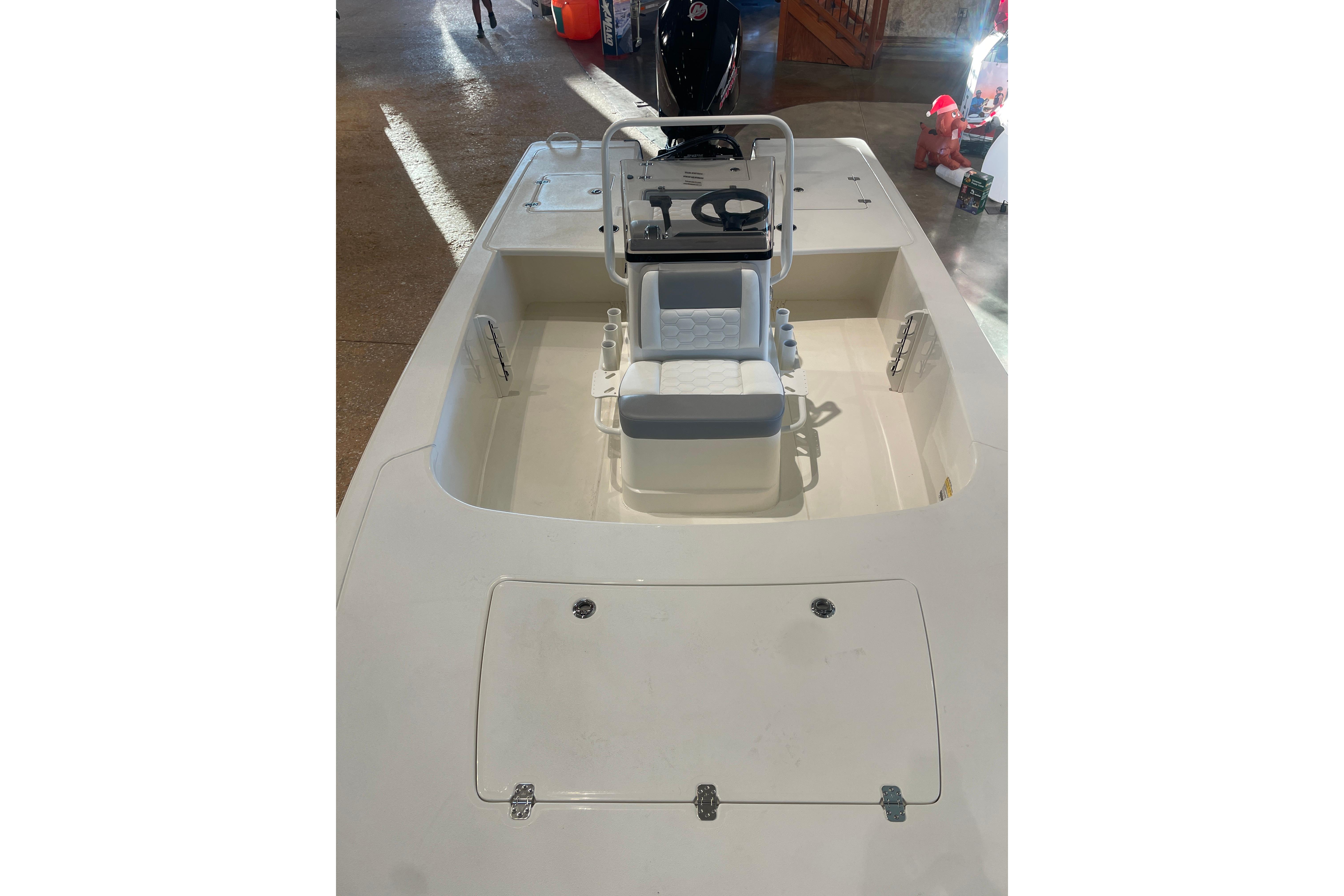 2026 Mako 18 Pro Skiff boat interior with seating and console.
