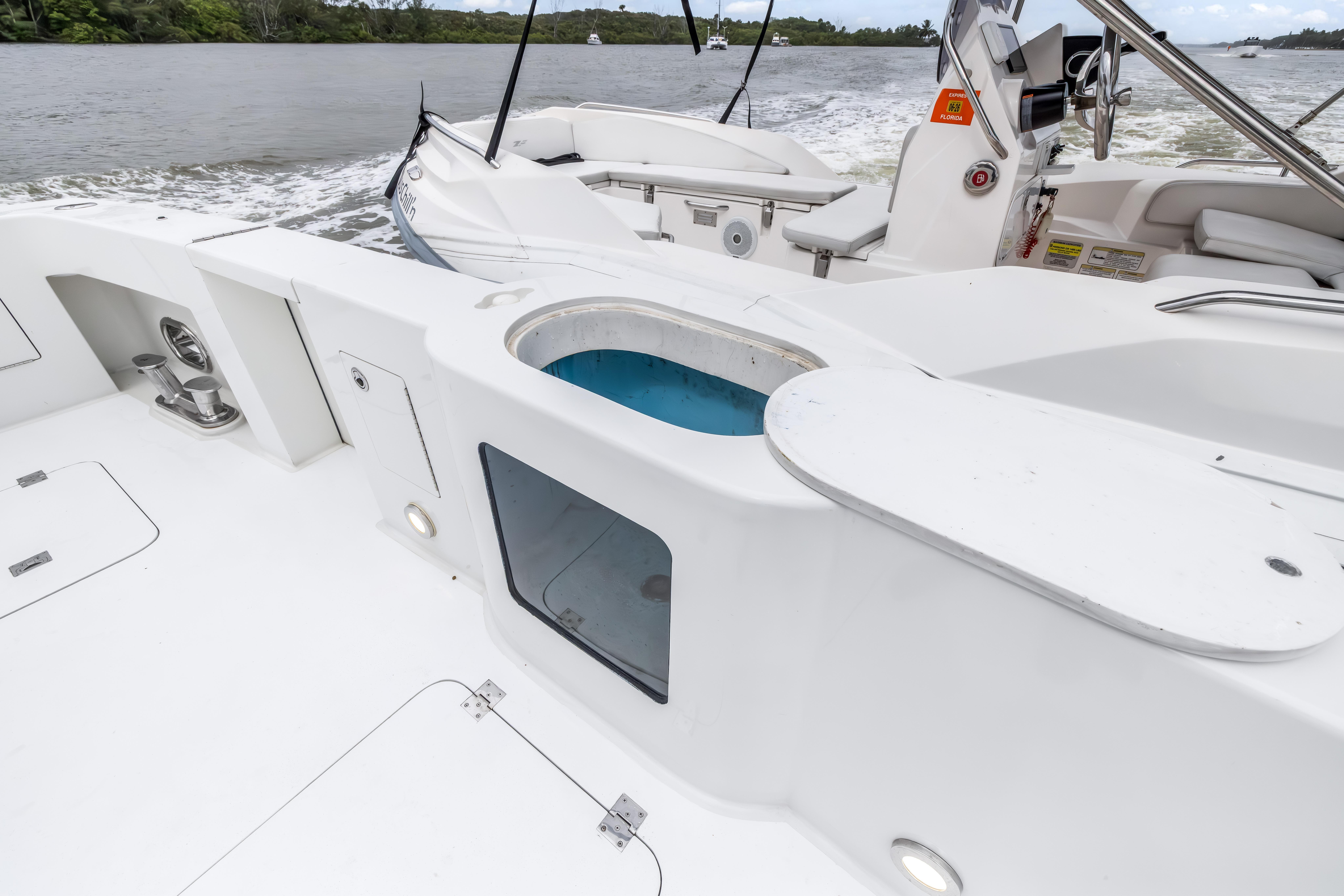2012 Cheoy Lee 84 Bravo yacht deck with seating and water view.