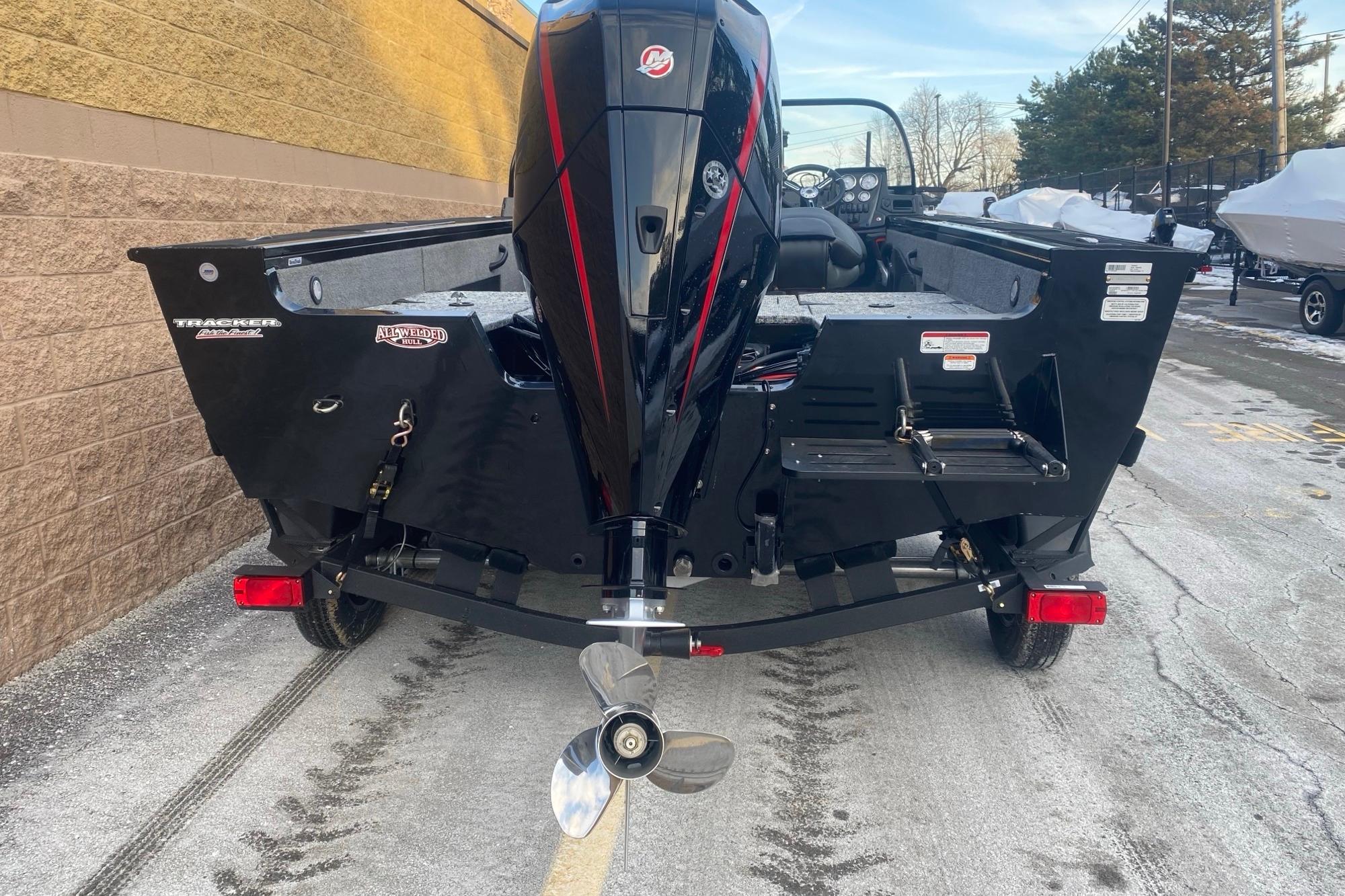 2026 Tracker Targa V-18 Combo boat, rear view with motor and trailer.