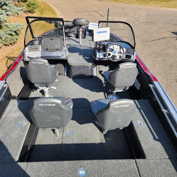 2024 Nitro ZV20 Pro fishing boat interior with four seats and steering console.