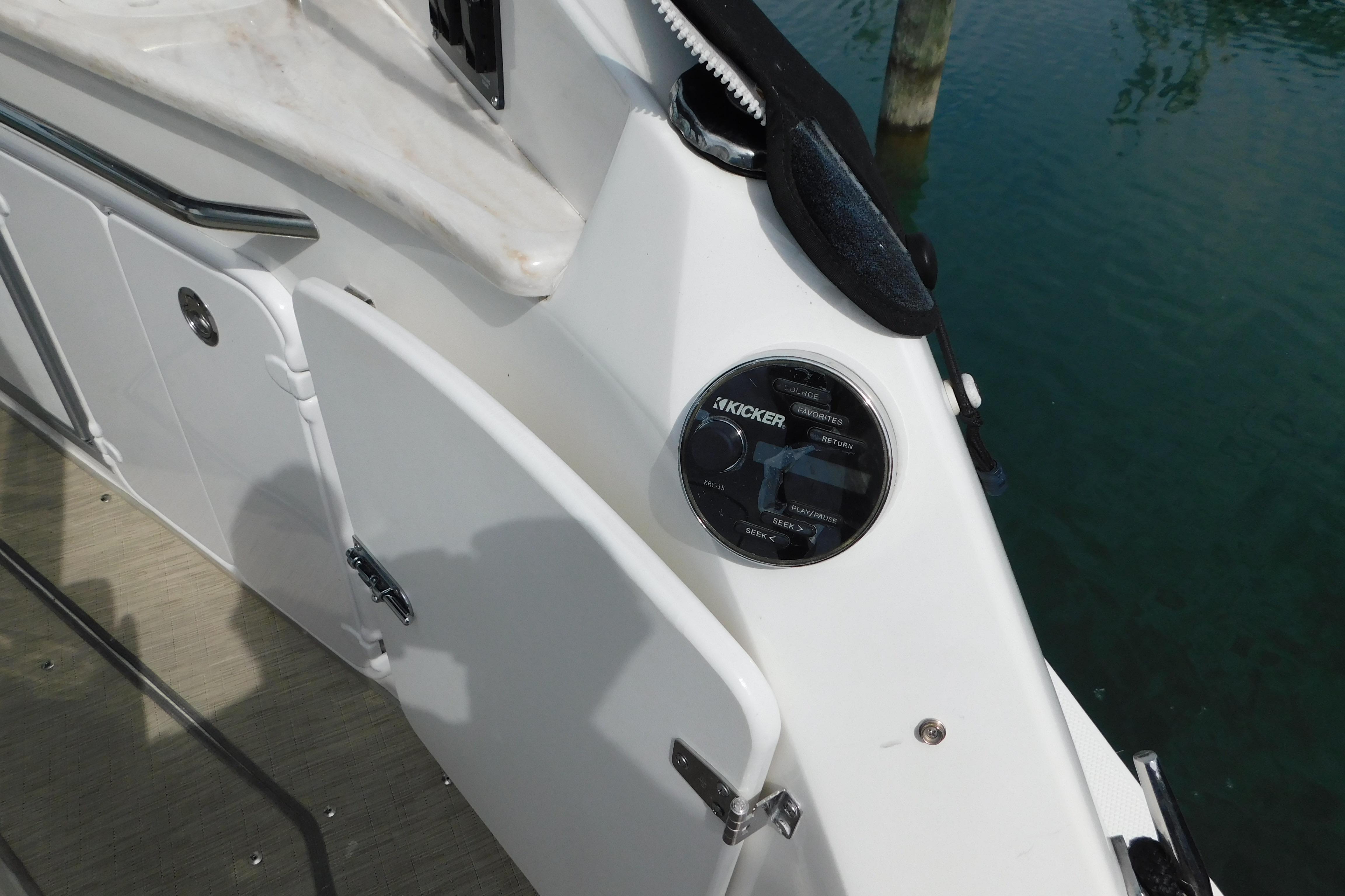 2017 Rinker EX 320 boat deck with Kicker audio control panel.