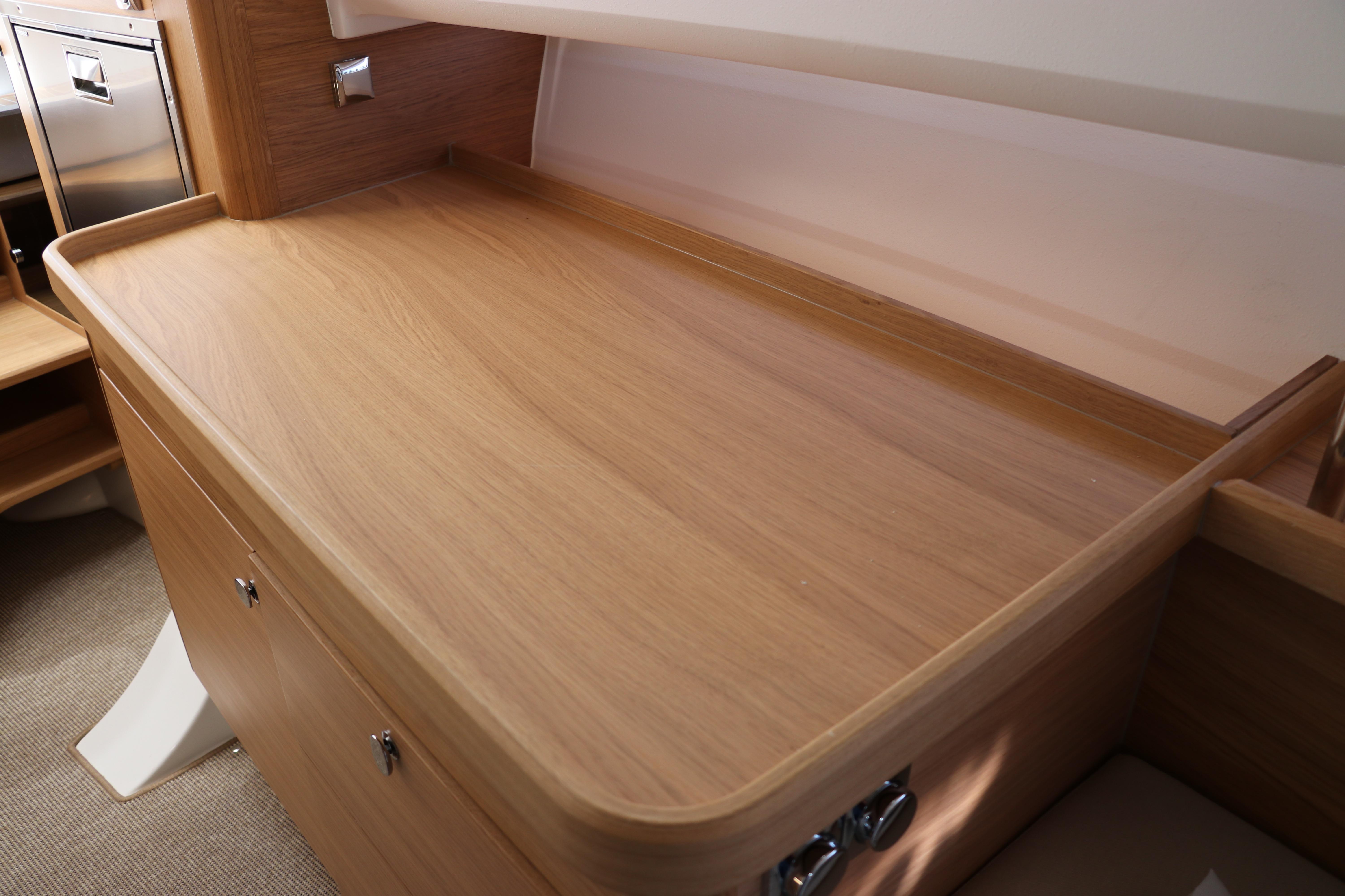 Wooden interior detail of 2025 Nimbus T11, showcasing sleek cabinetry design.