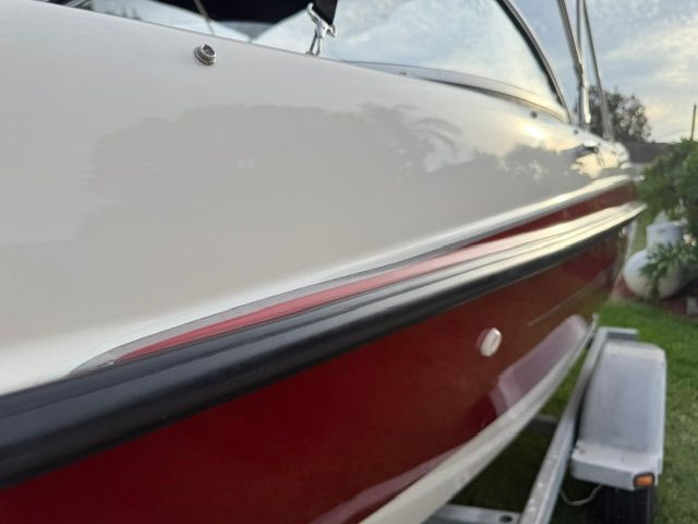 Close-up of a 2012 Bayliner 184 SF boat on a trailer.