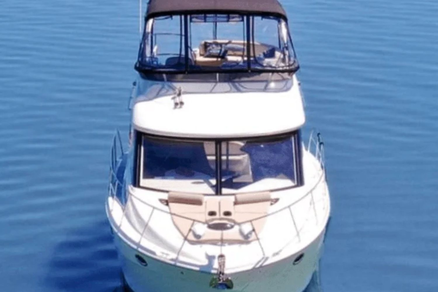 2013 Meridian 391 Sedan on calm water.