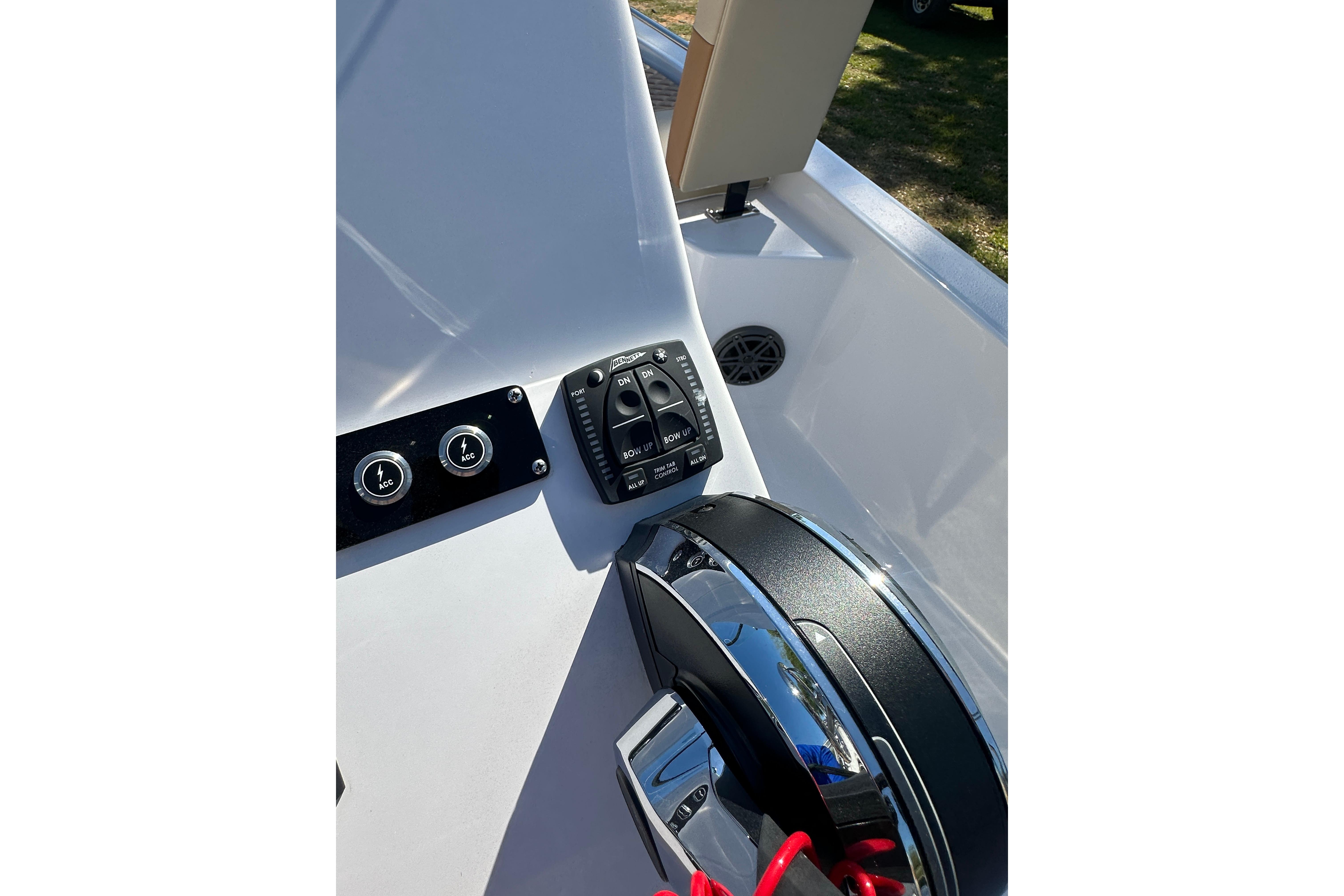Control panel of 2026 Action Craft 22 Bay boat with steering wheel.