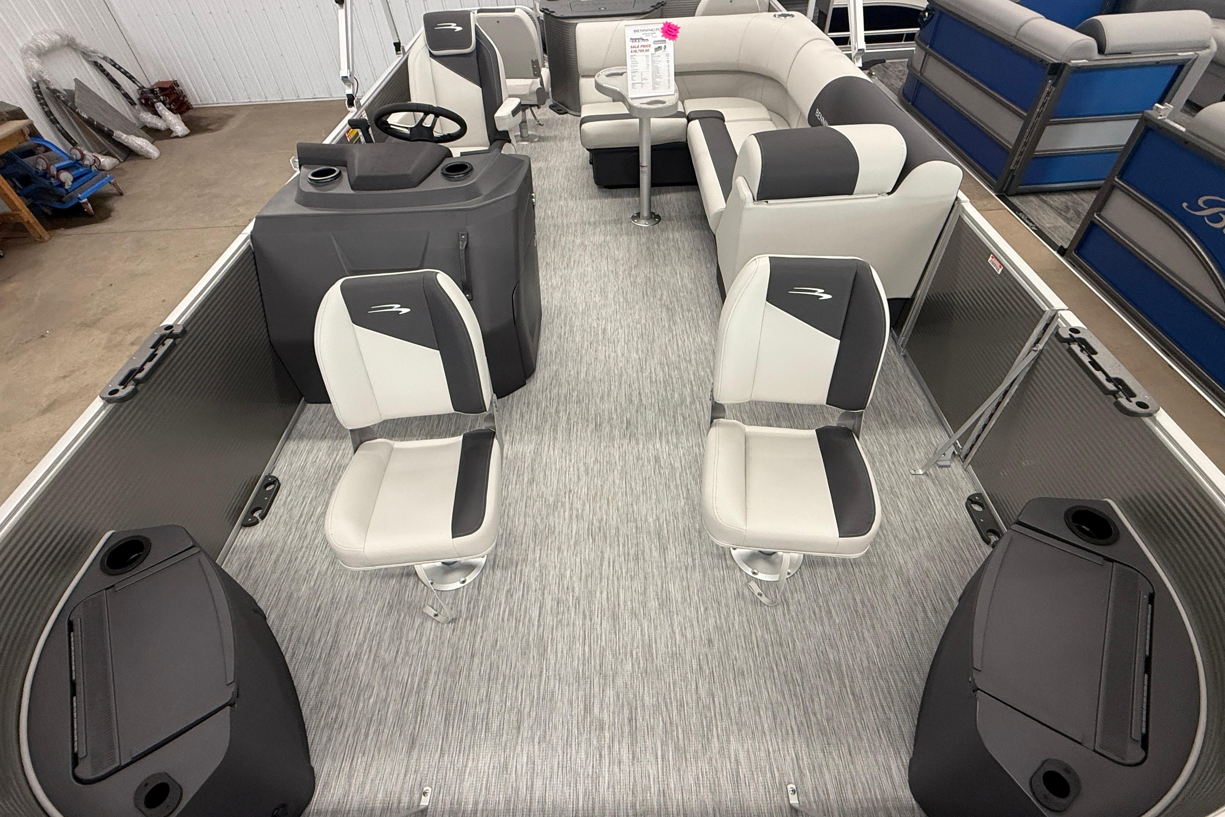 2026 Bennington 20 SF pontoon boat interior with modern seating and steering console.