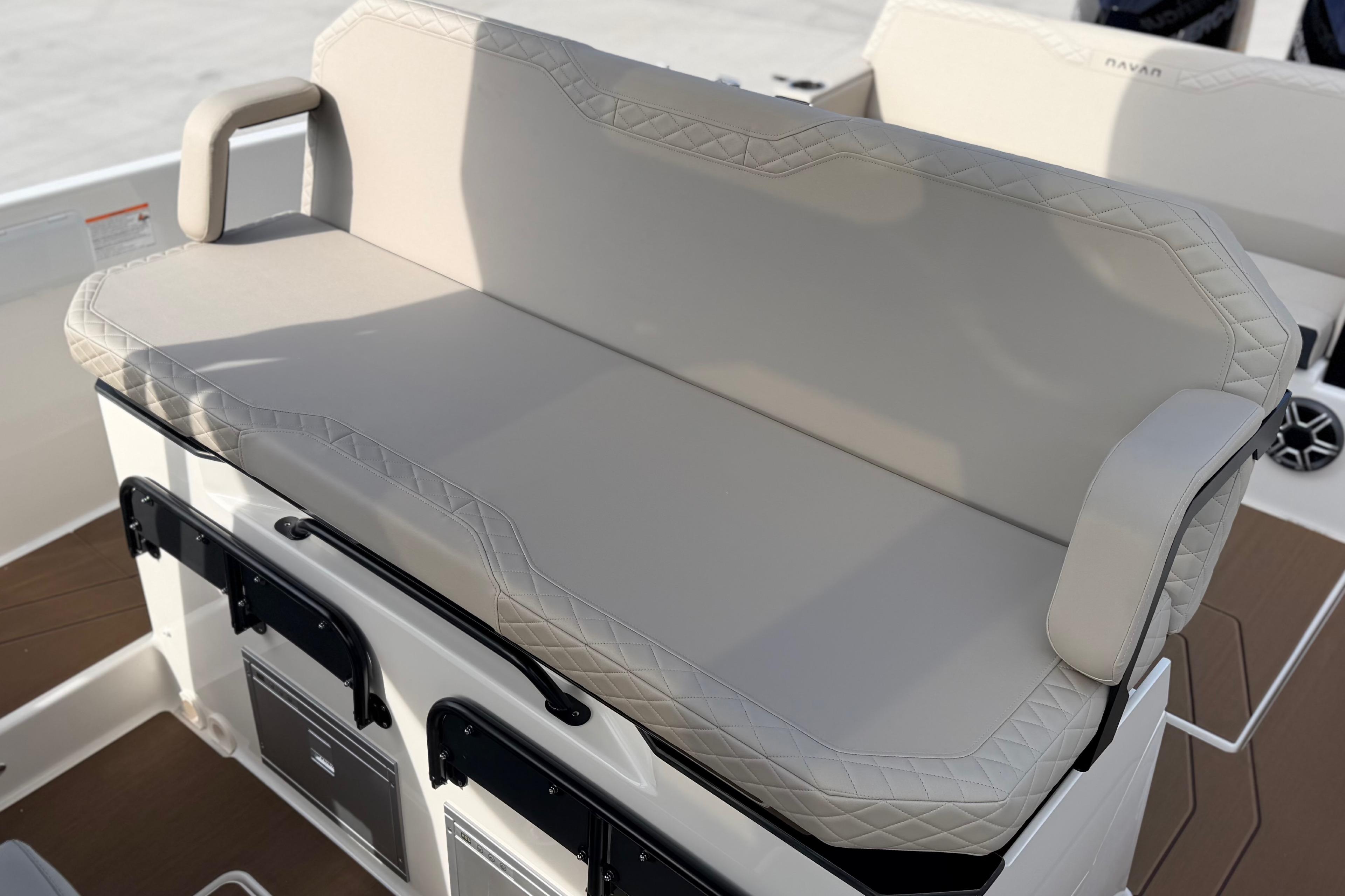 Luxurious seating on 2026 Navan S30 boat, featuring elegant beige upholstery.