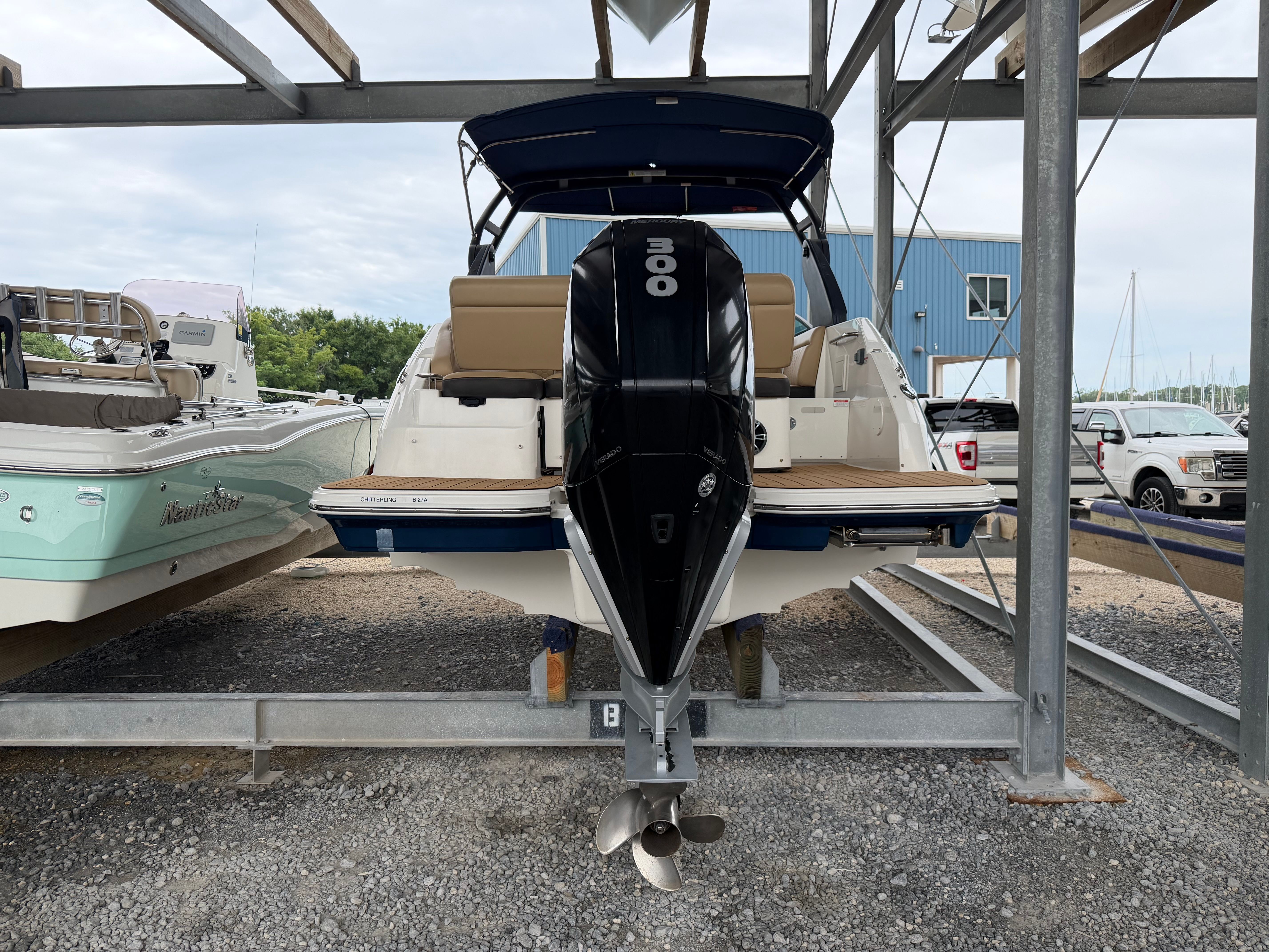 2020 Sea Ray SDX 250 Outboard on a boat trailer.