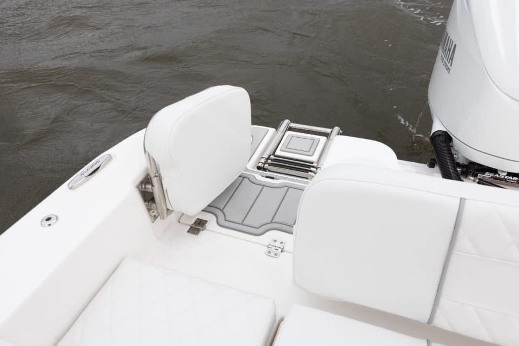 2027 Sea Fox 248 Commander boat with white seating and Yamaha engine on water.