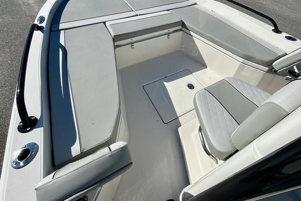 2026 Ranger 2360 Bay boat interior with cushioned seating and storage compartments.