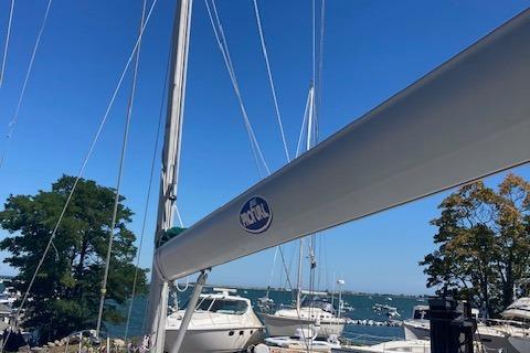 1988 Westerly Corsair 36 sailboat docked at a marina with clear blue skies.