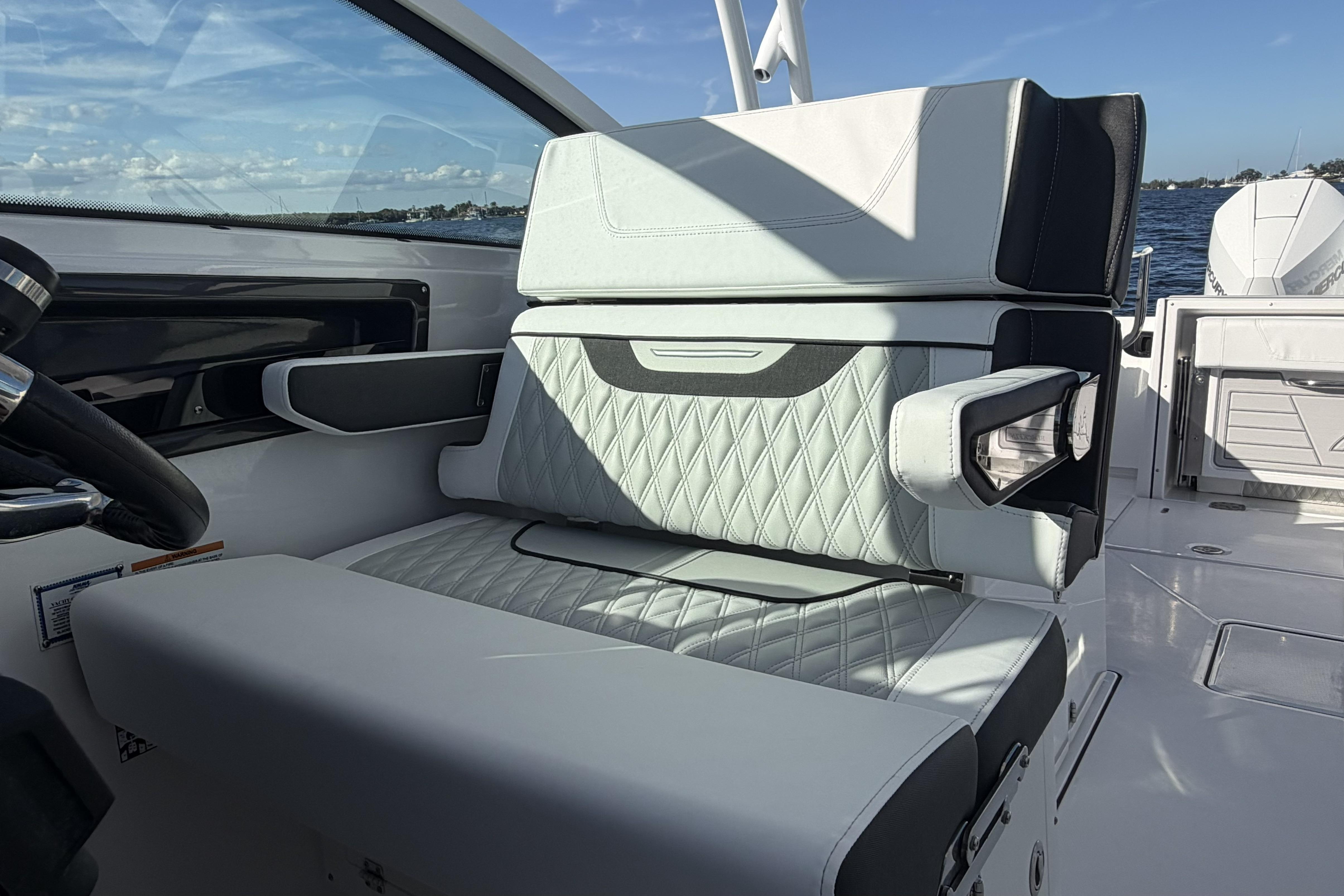 Luxury seating on 2025 Blackfin 272 DC boat, featuring modern design and comfort.