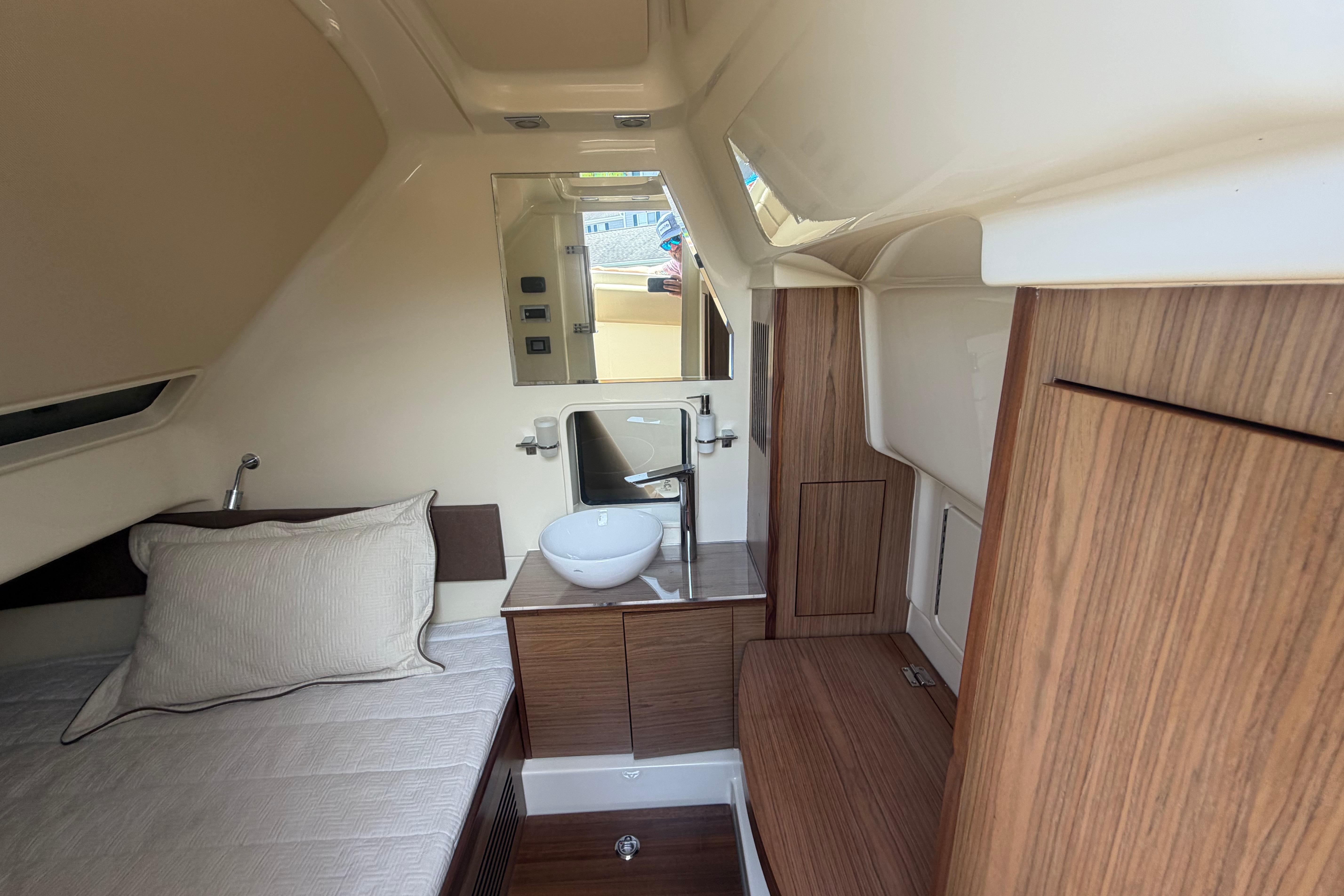 Luxurious interior of 2017 Chris-Craft Catalina 34 with elegant wood finishes and modern amenities.