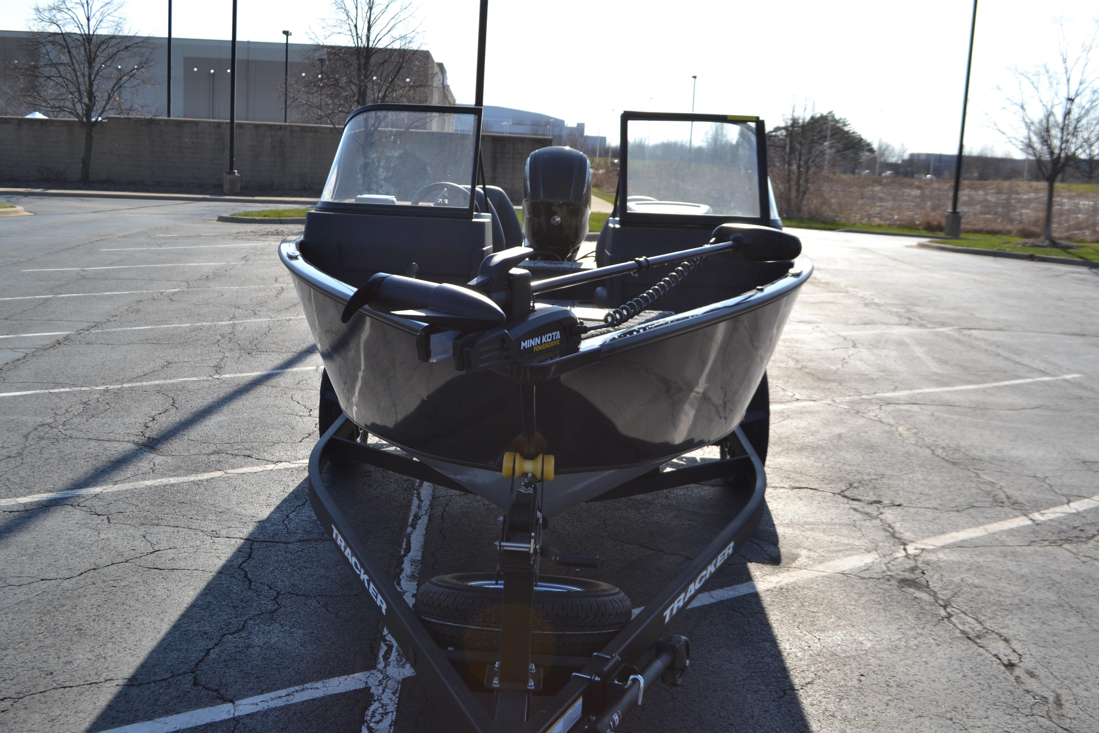 2026 Tracker Pro Guide V-175 WT boat parked on trailer outdoors.