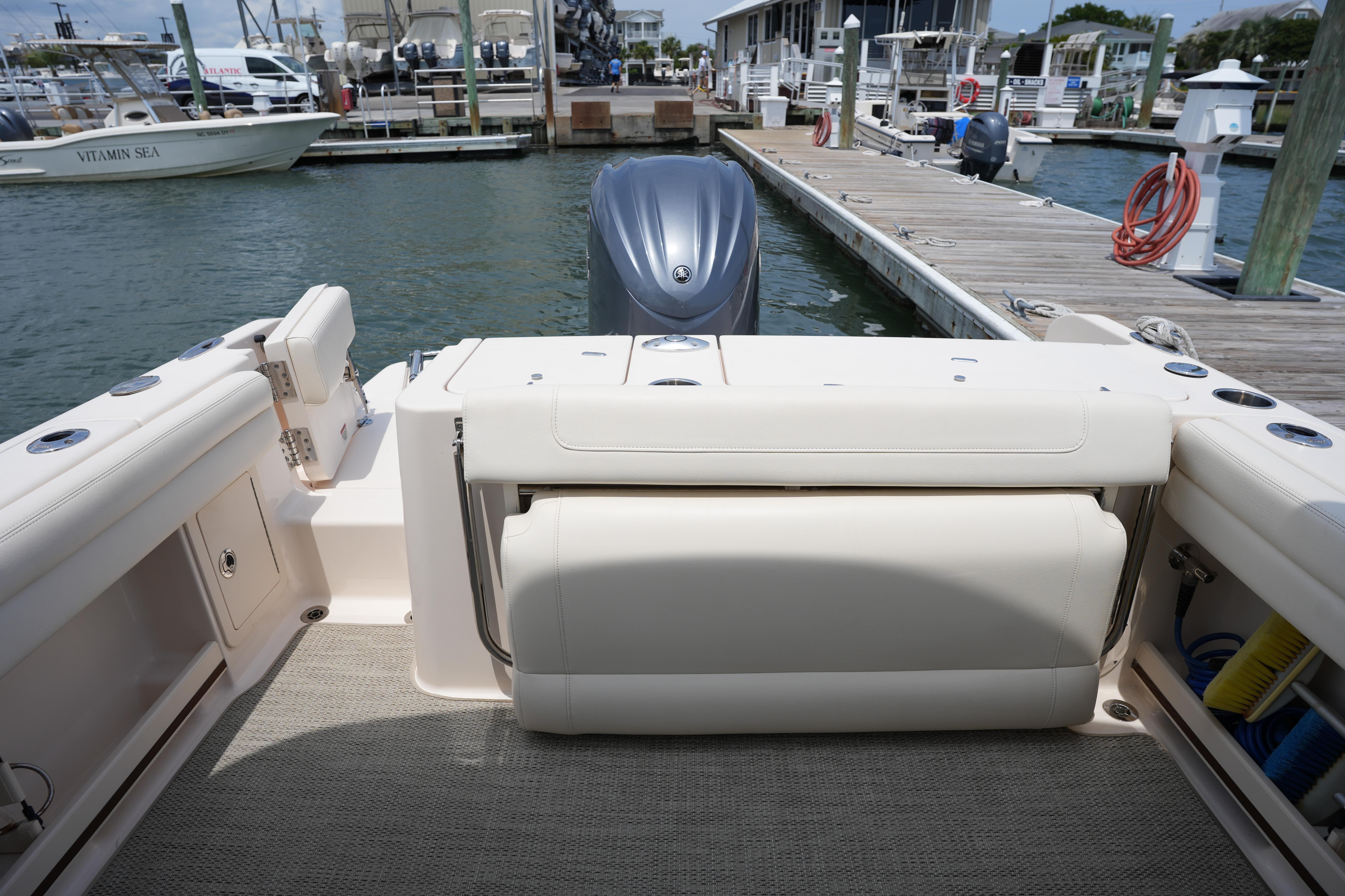 2021 Grady-White Freedom 235 boat interior at marina dock.