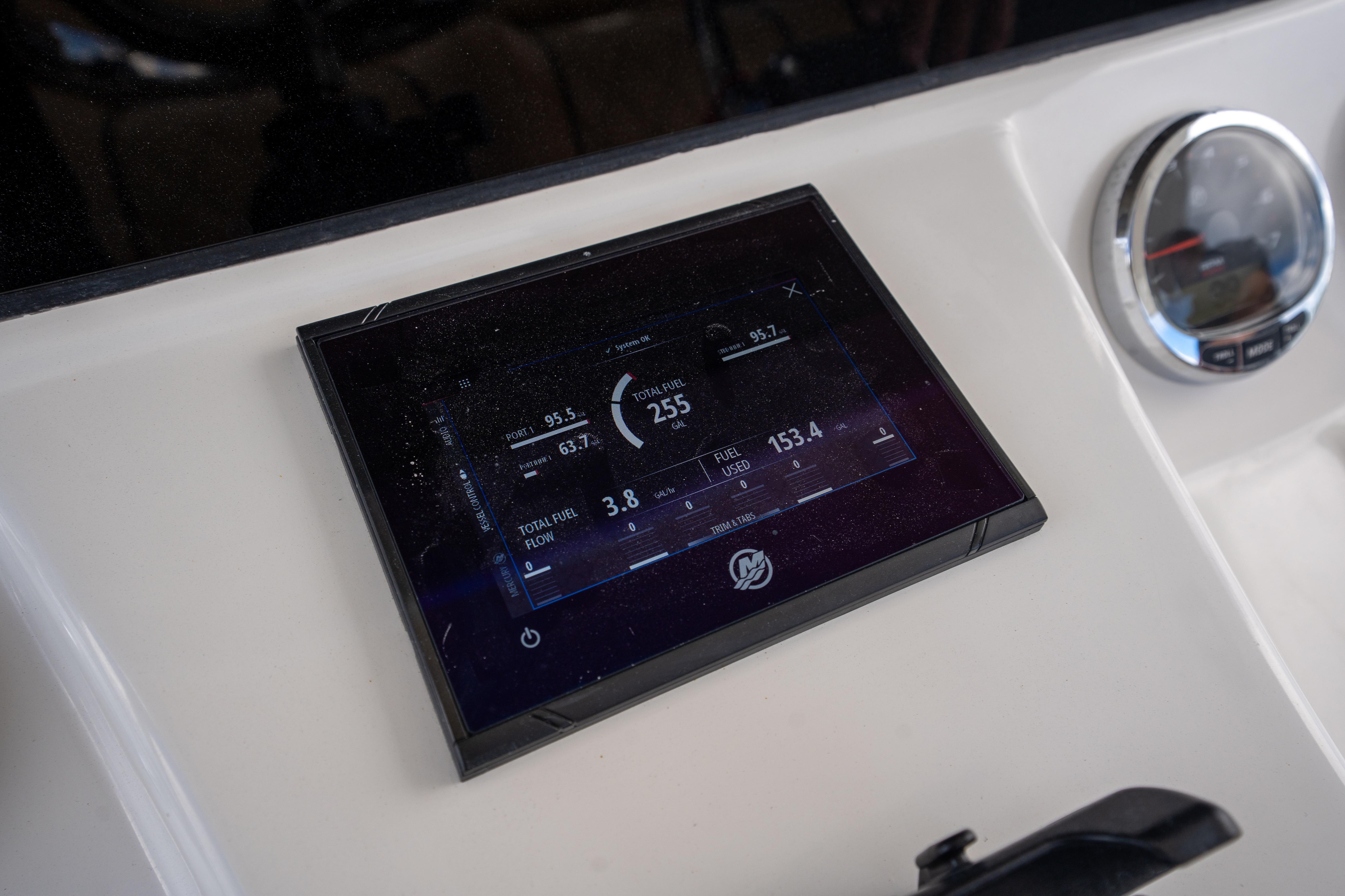 Dashboard of 2026 Blackwater 41 Performance Fish boat with digital display and gauge.