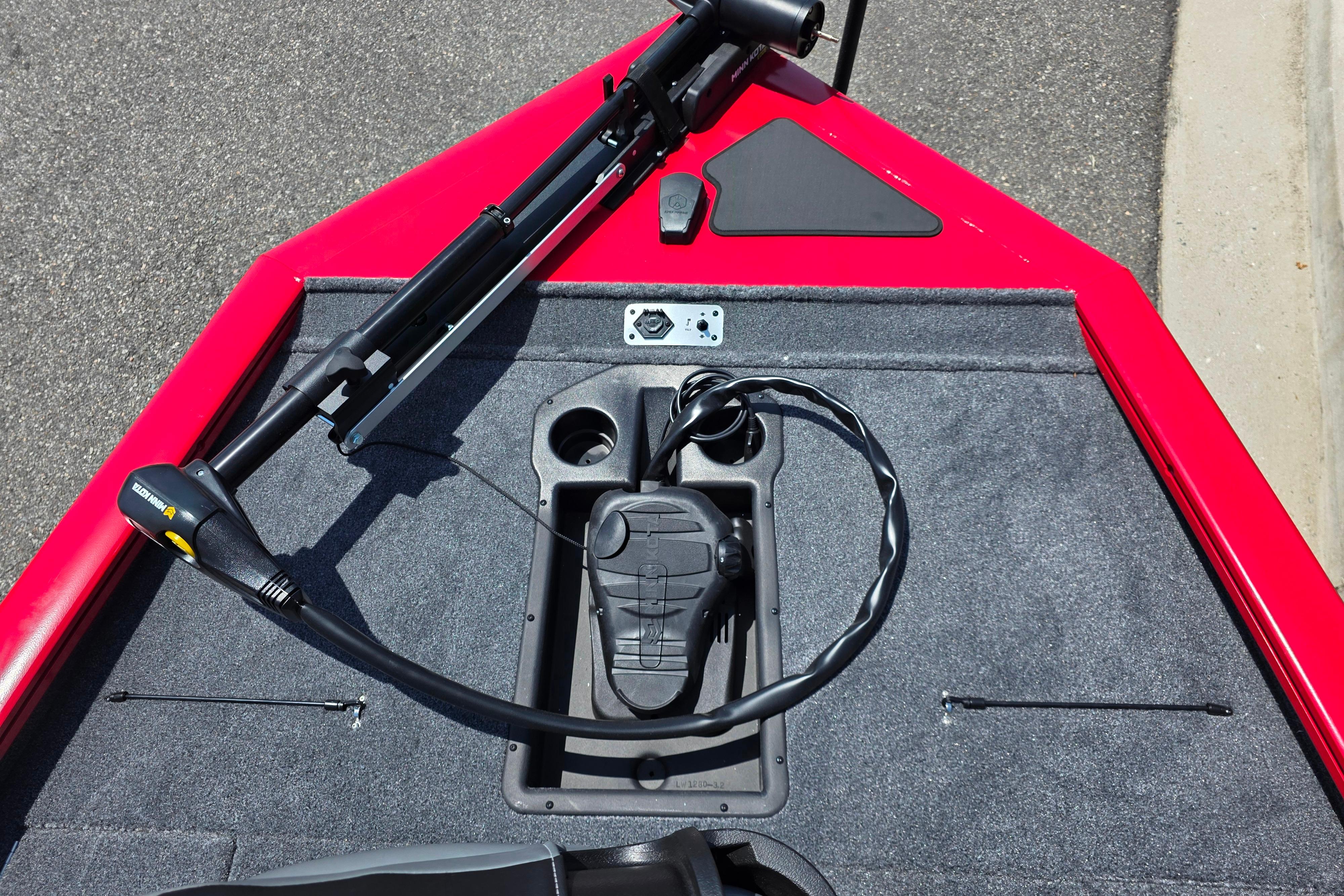 2026 Tracker Pro Team 195 boat deck with trolling motor and foot pedal controls.