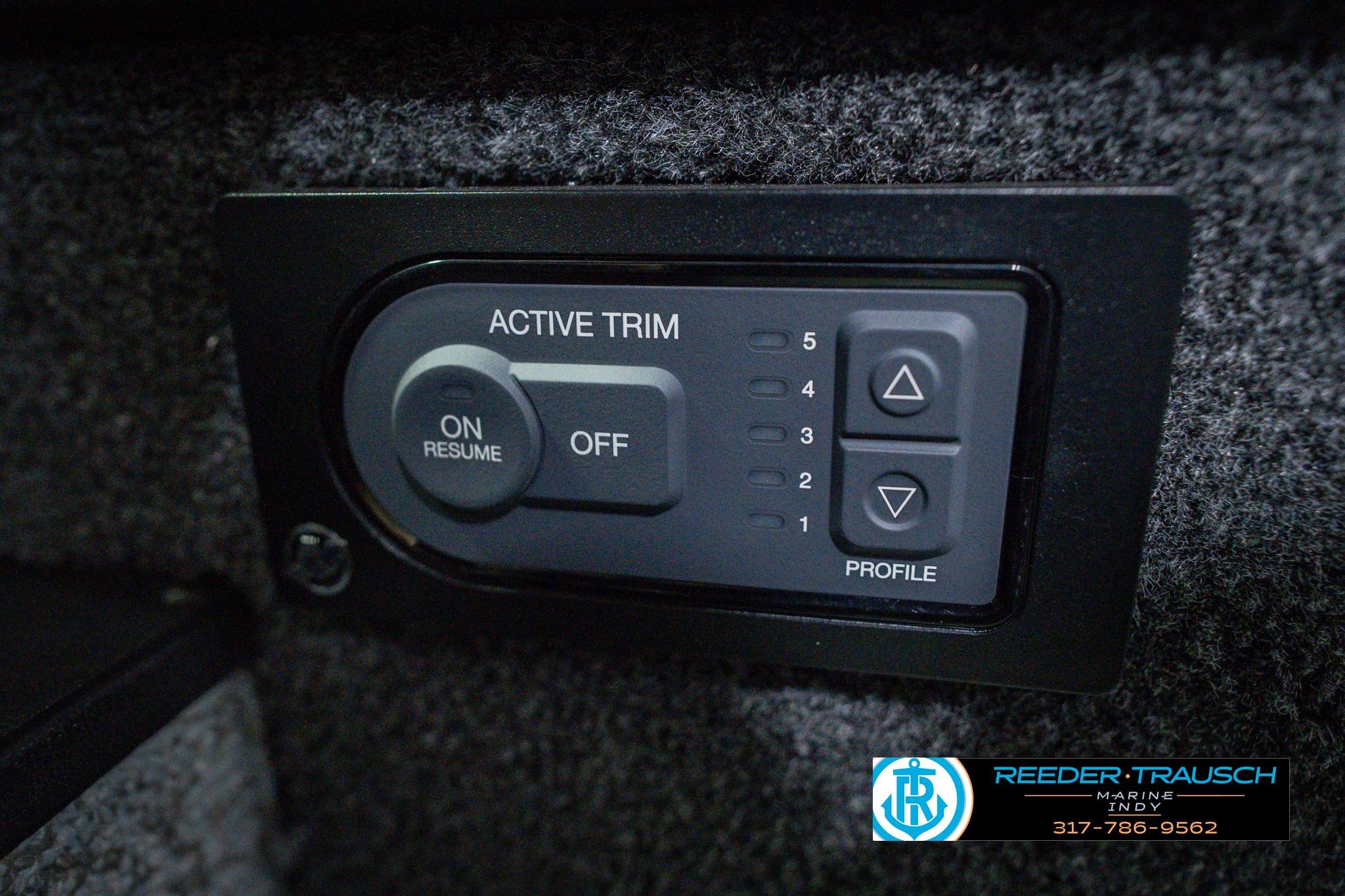 Active trim control panel on 2026 Lund 1775 Impact XS boat dashboard.