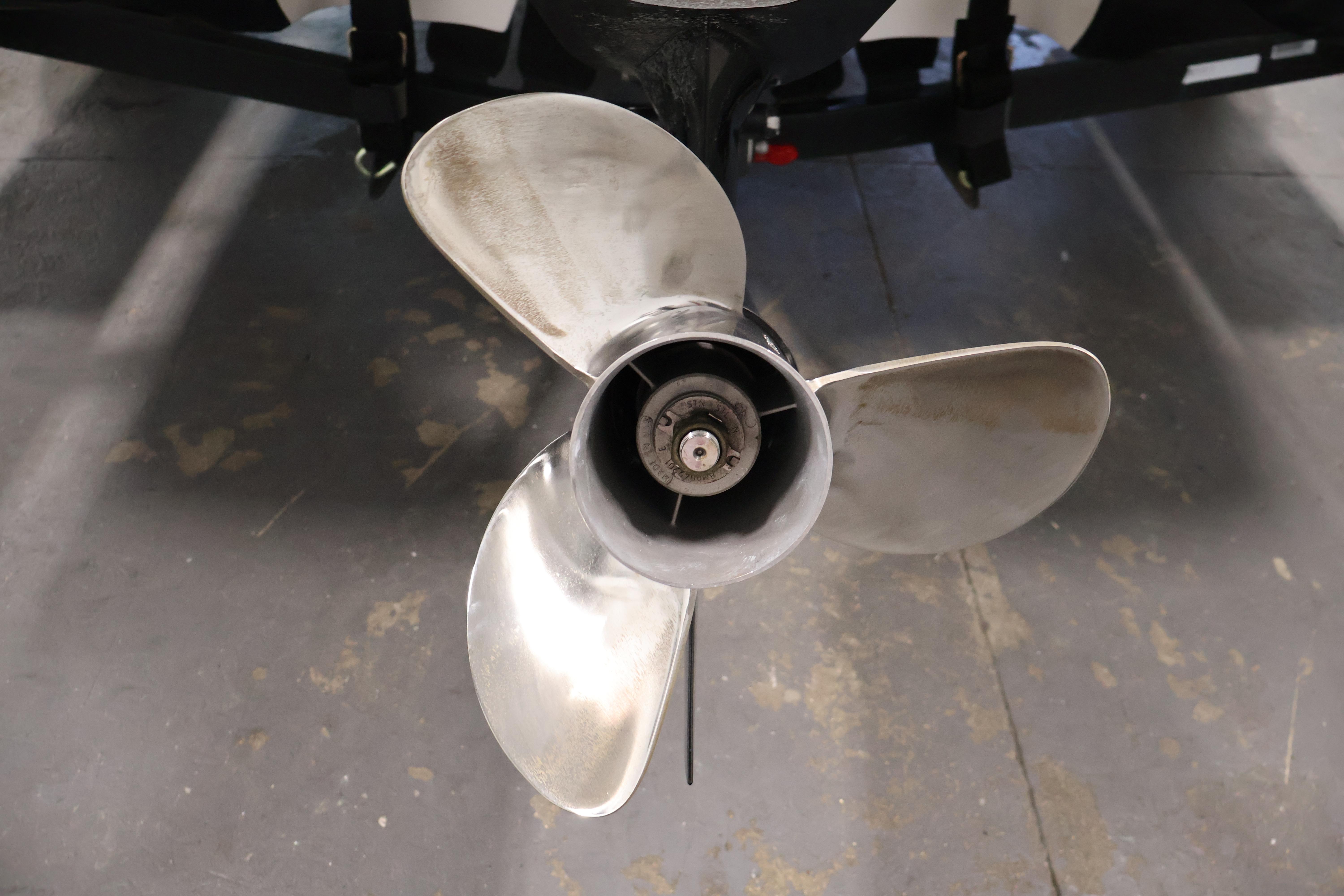 Propeller of a 2019 Nitro Z19 Sport boat on a concrete floor.