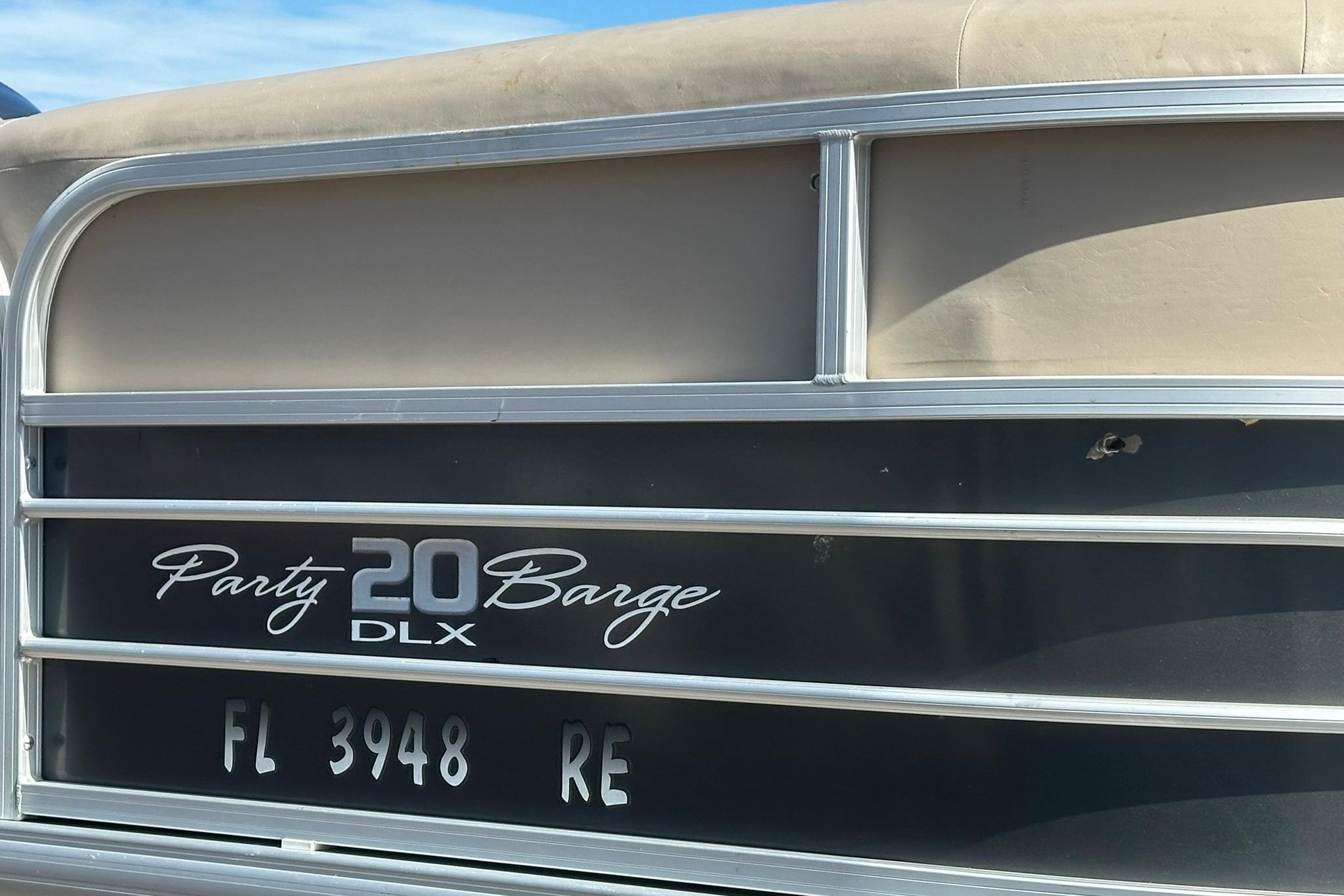 2016 SUNTRACKER Party Barge 20 DLX pontoon boat with registration FL 3948 RE.