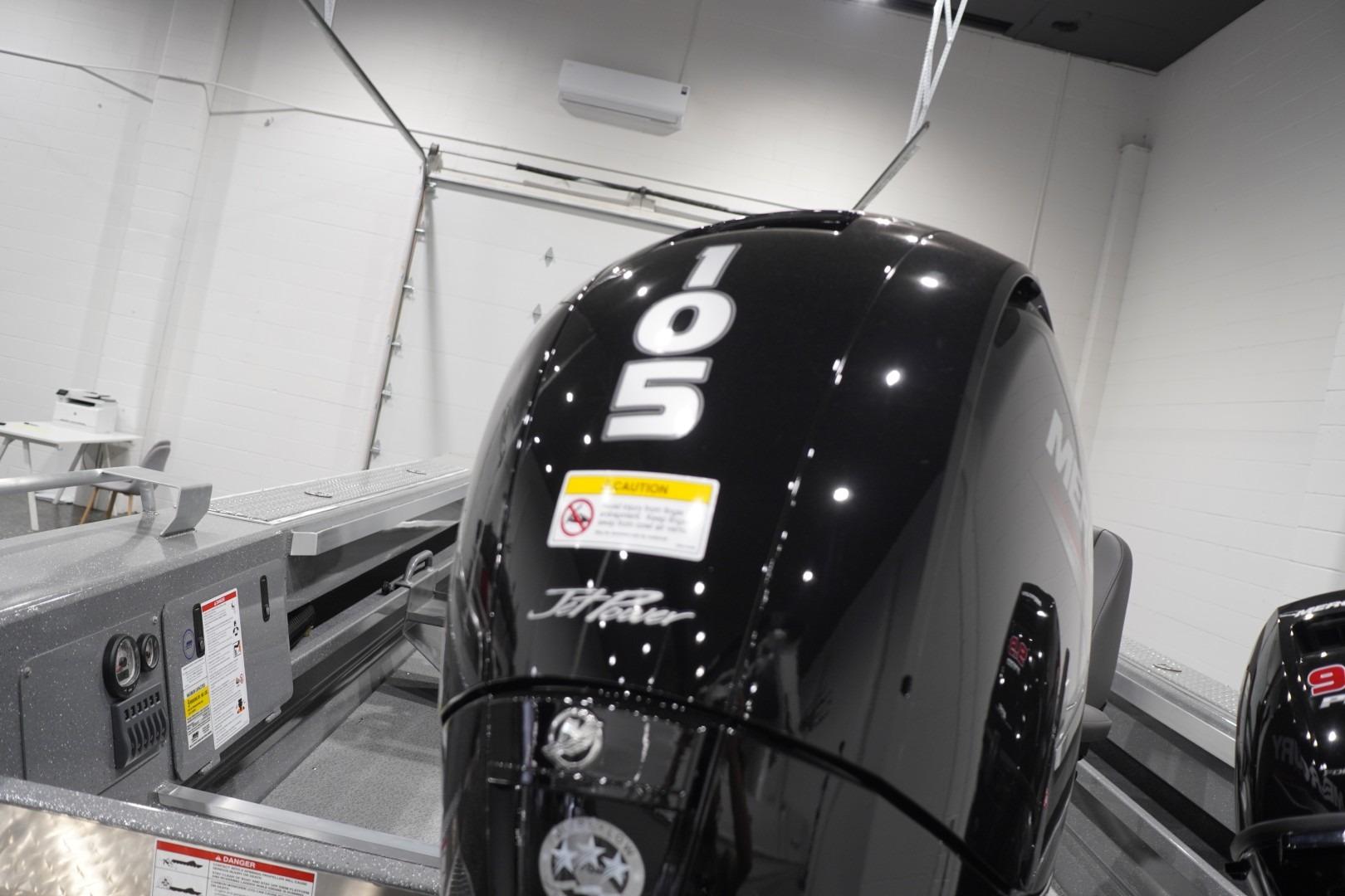 2026 Thunder Jet 209 Rush OT boat engine, featuring a sleek black design with "105" marking.