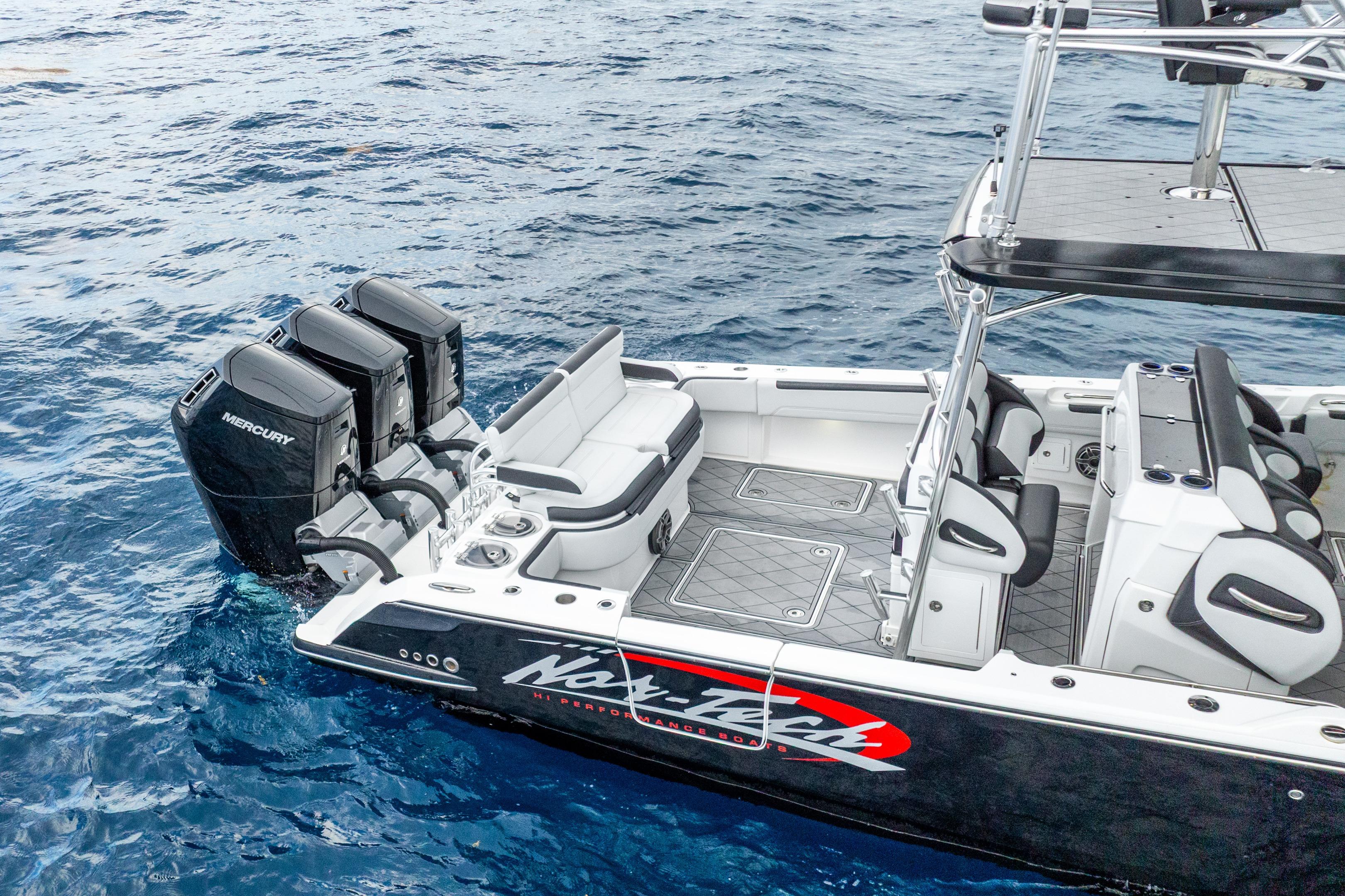 2024 Nor-Tech 452 Super Fish boat with triple Mercury engines on open water.