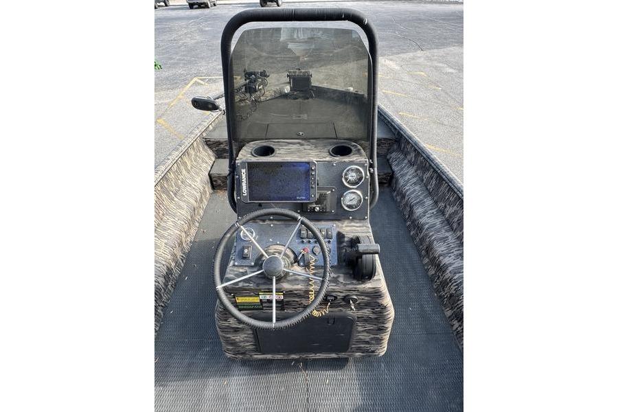 2023 Havoc 1756 MRST boat console with steering wheel, gauges, and navigation system.