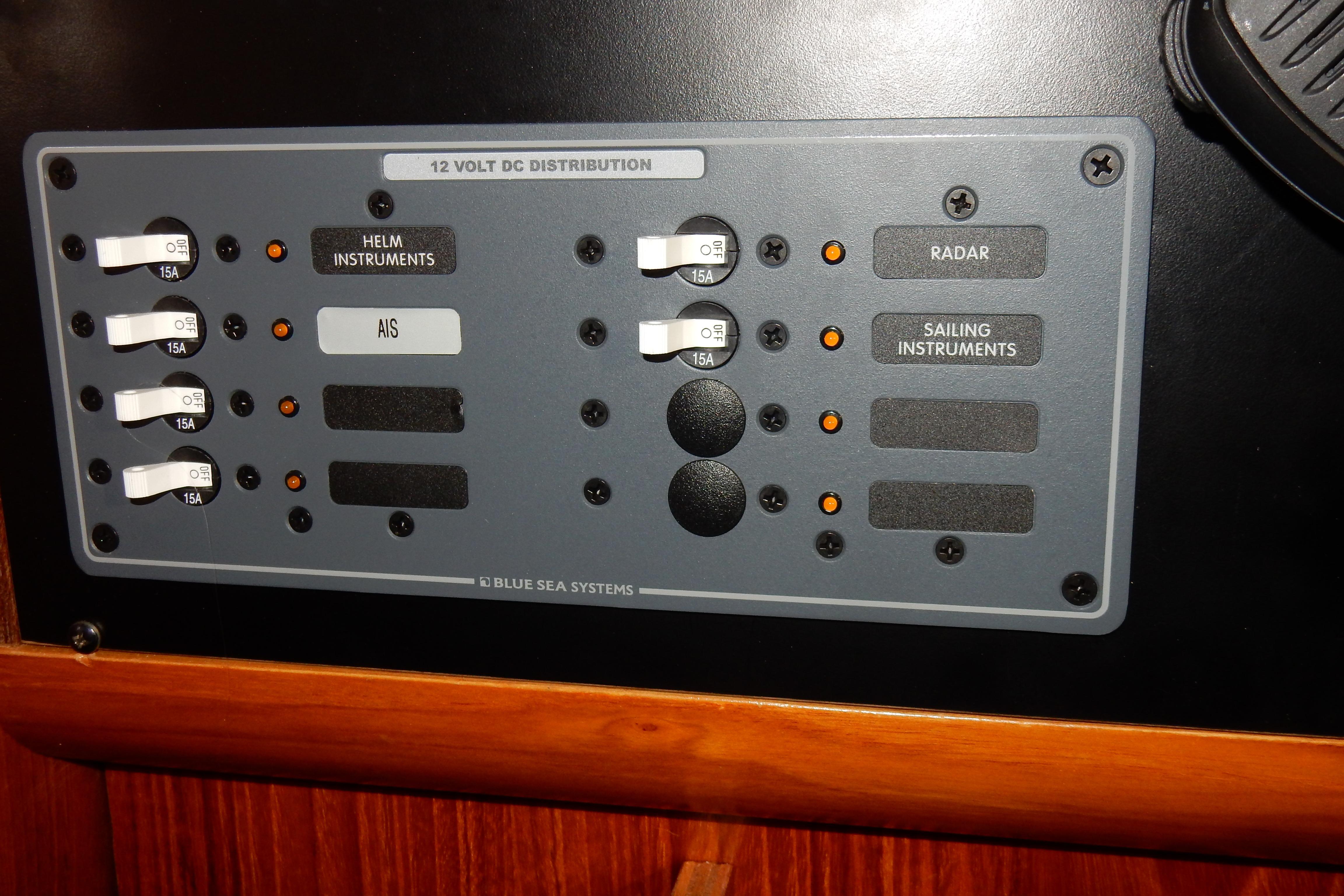 Control panel of a 1991 Beneteau Oceanis 370 sailboat, featuring instrument switches.