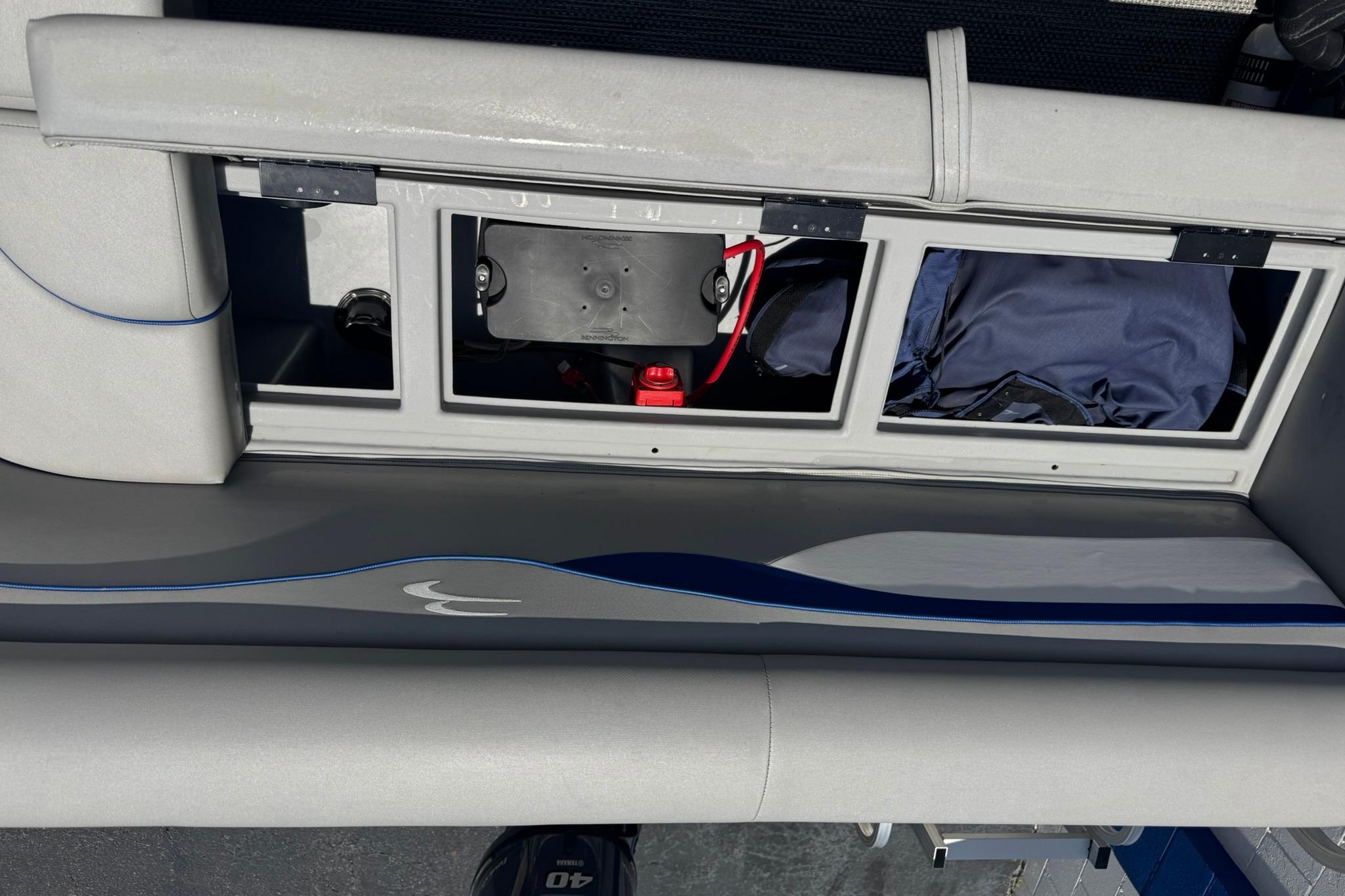 2024 Bennington SV 168 SLV 8' Narrow Beam boat interior storage compartments.