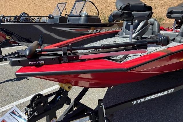 2026 Tracker Pro Team 175 boat with Minn Kota trolling motor, parked on trailer.