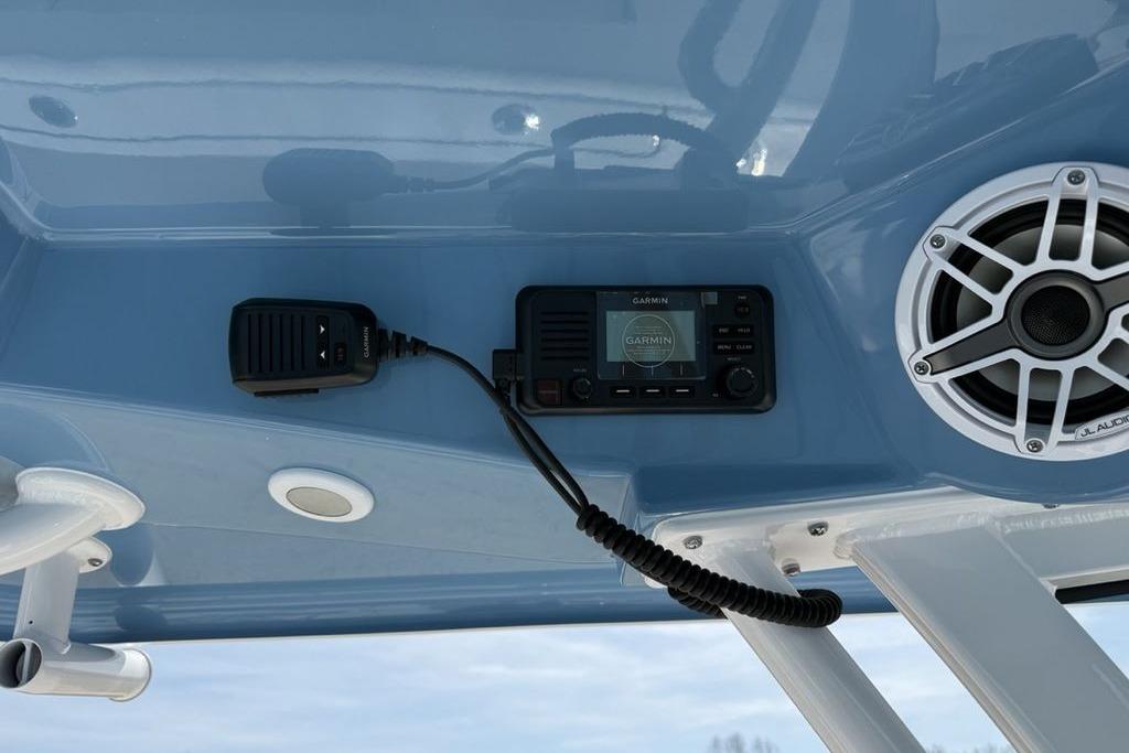 2026 Sportsman Open 252 Center Console with Garmin radio and JL Audio speaker.