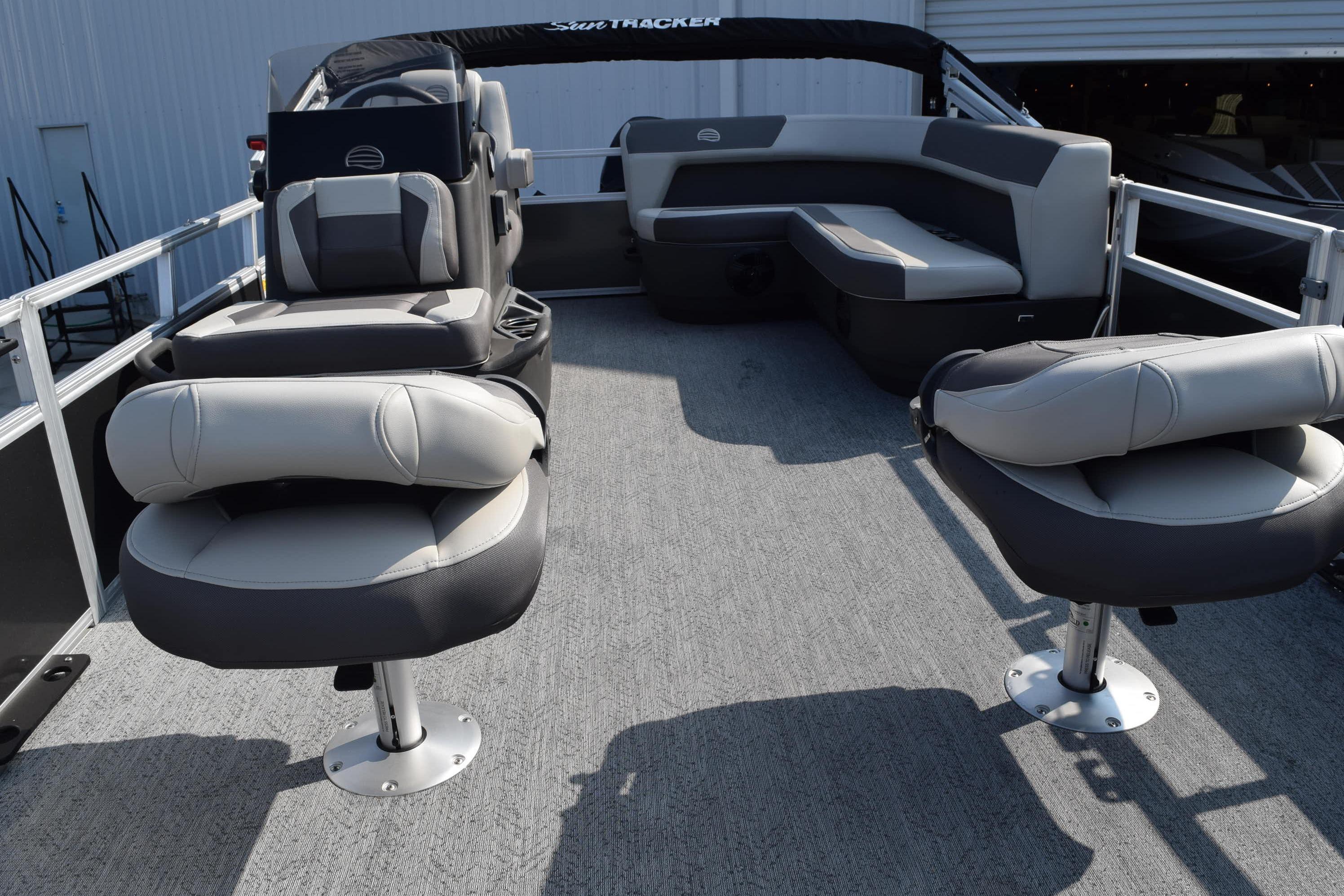 2026 Sun Tracker Bass Buggy 16 XL Select pontoon boat interior with seating and helm.