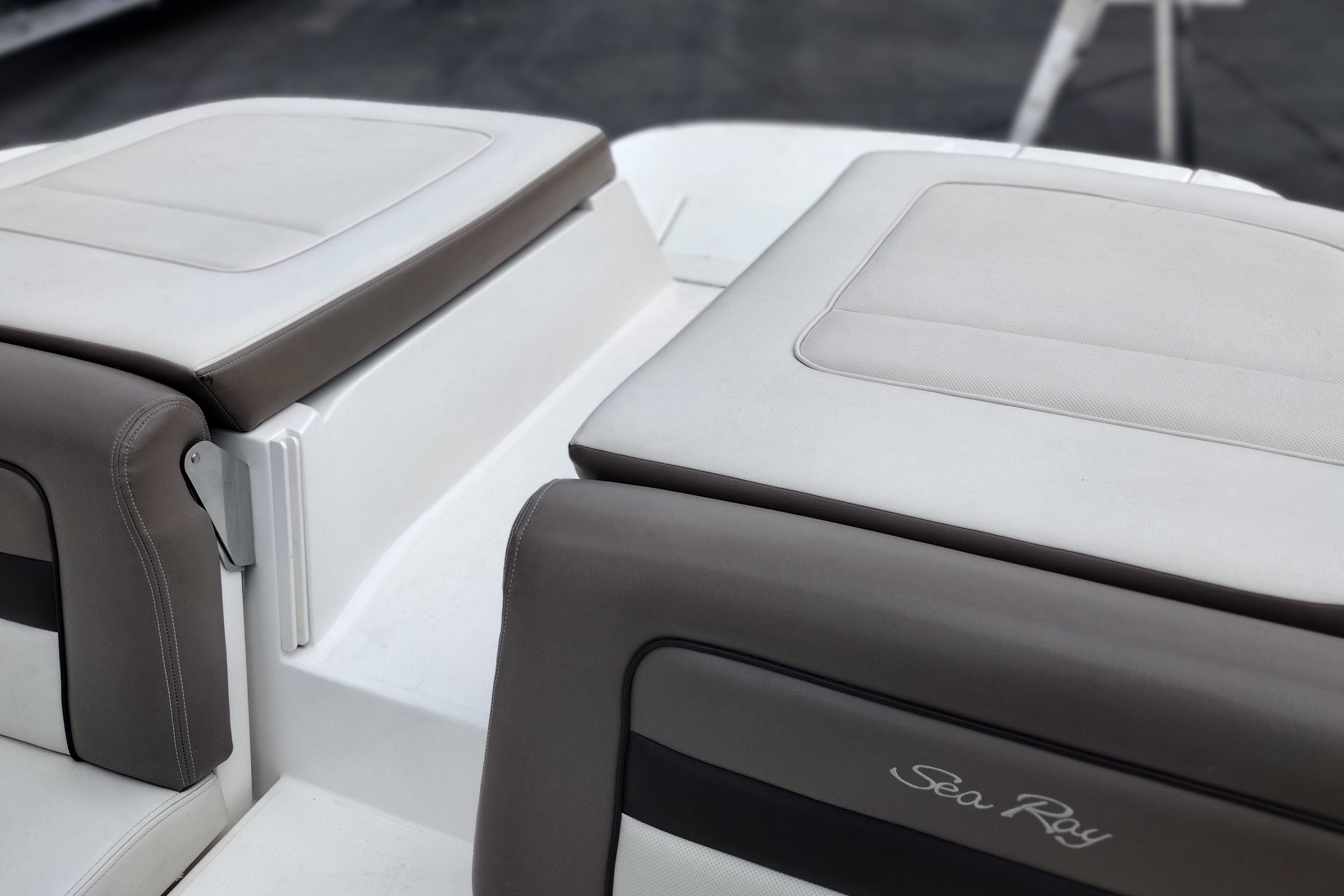 Luxury seating on a 2013 Sea Ray 300 SLX boat, featuring sleek design and comfort.