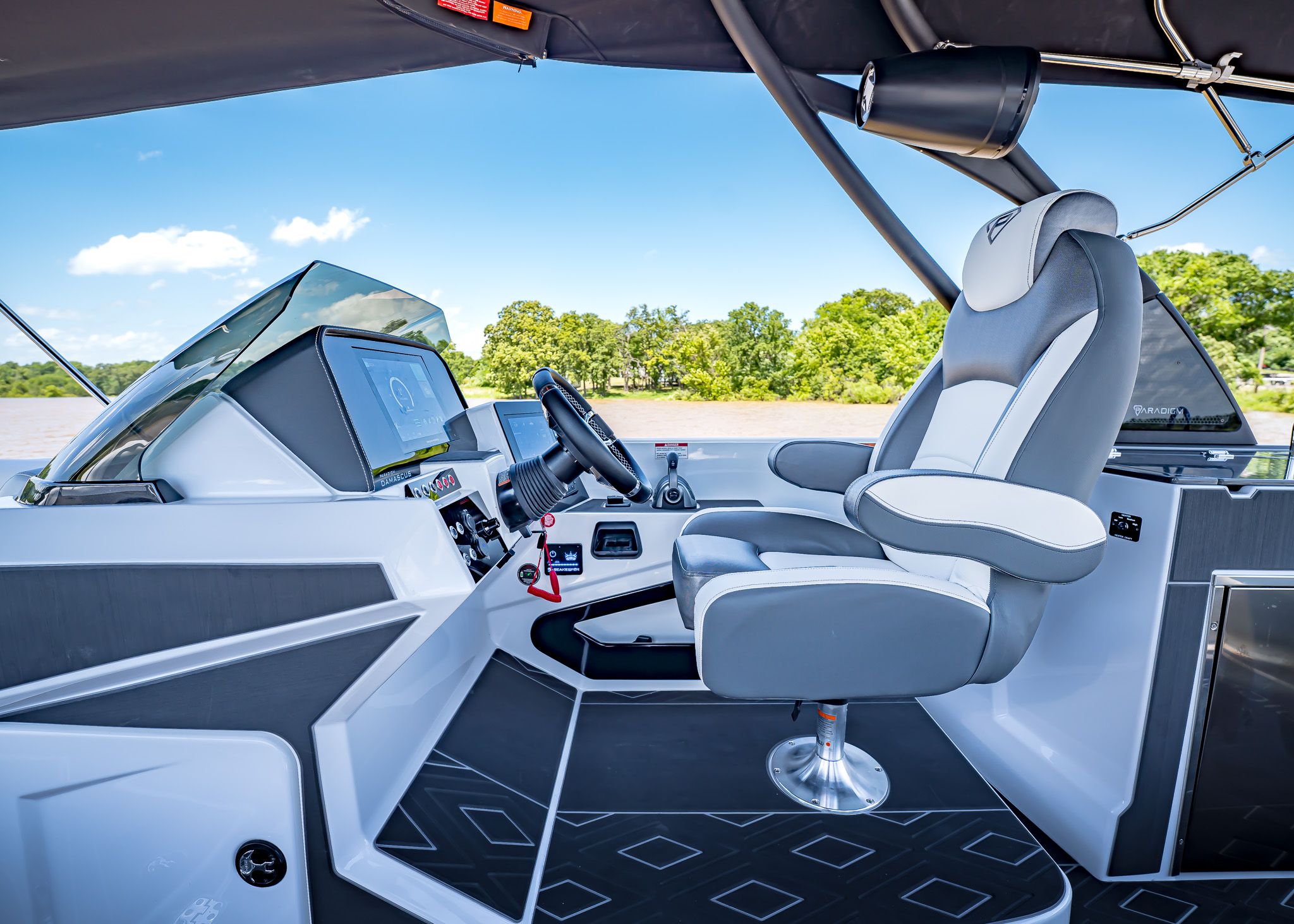 Interior of Paradigm 266 SL SURF boat, model year 2025.