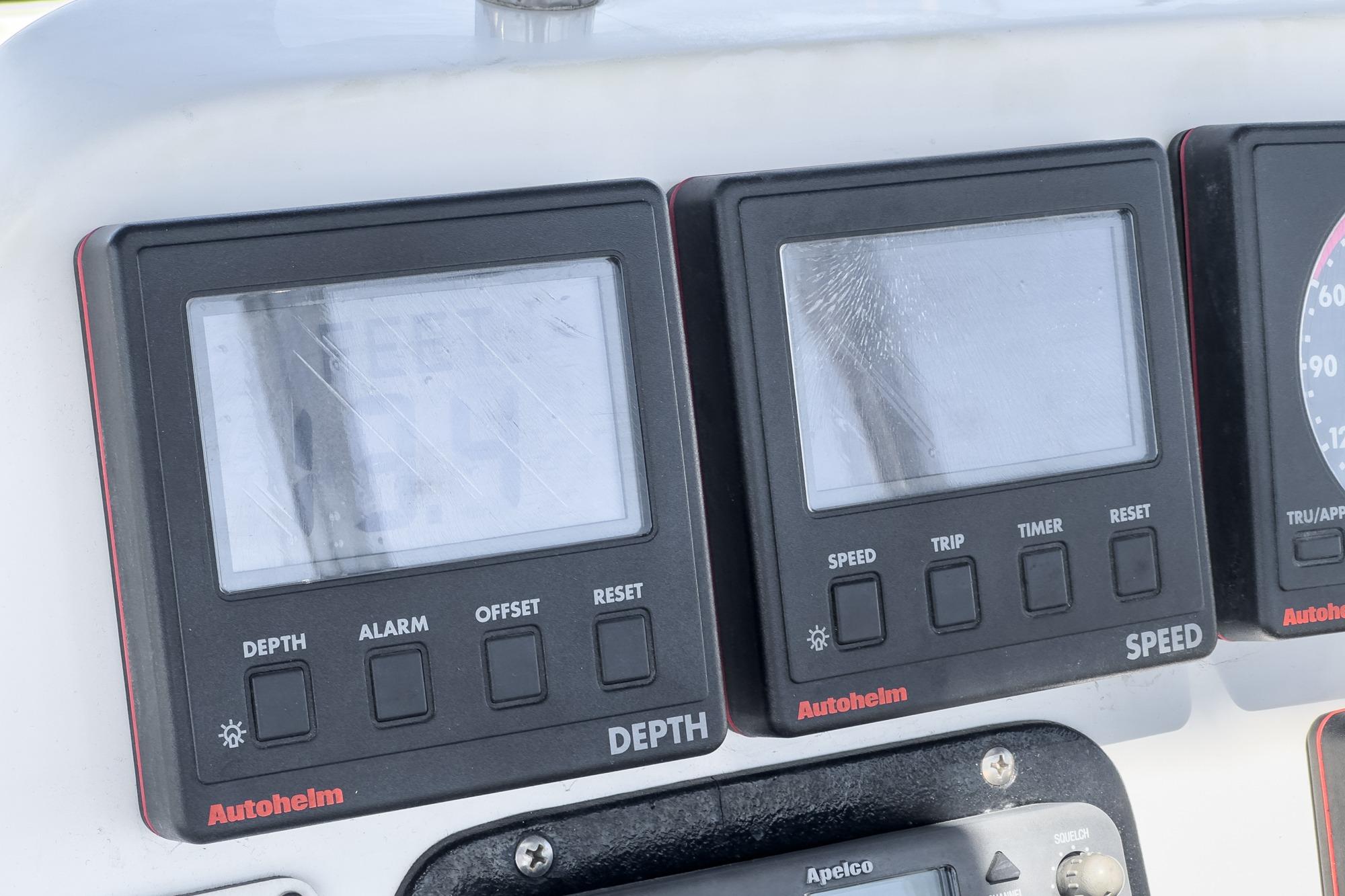 Autopilot display panel on a 1996 Hunter 376 sailboat, featuring depth and speed indicators.