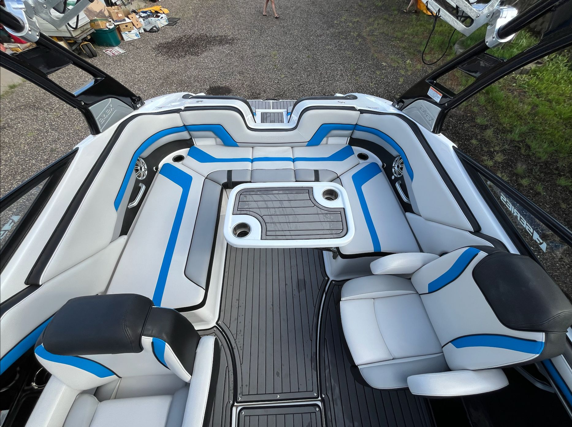 Interior of a 2017 Yamaha Boats 242X E-Series with blue accents.