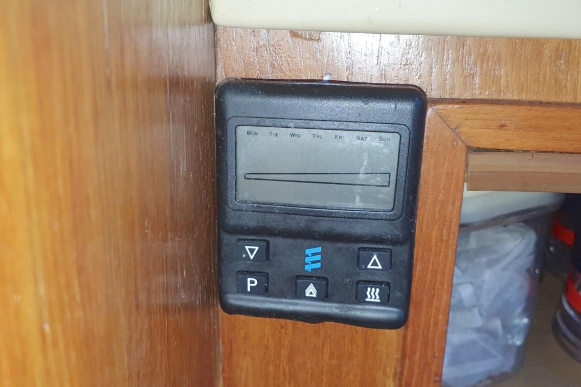 Control panel on a 1989 Fairey Spearfish MKIII boat, mounted on wooden surface.