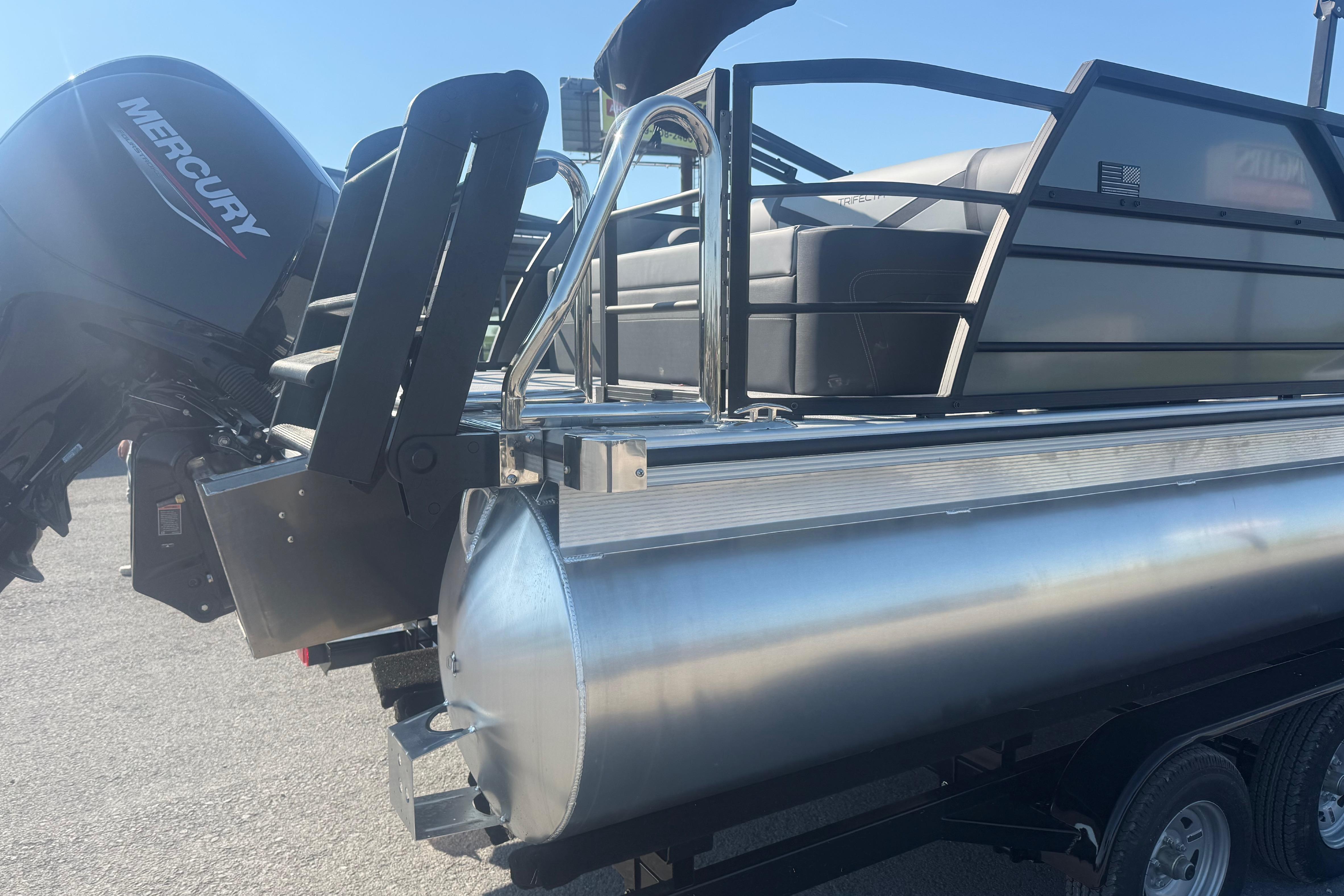 2026 Trifecta 22ULCS pontoon boat with Mercury engine, sleek design, and modern features.