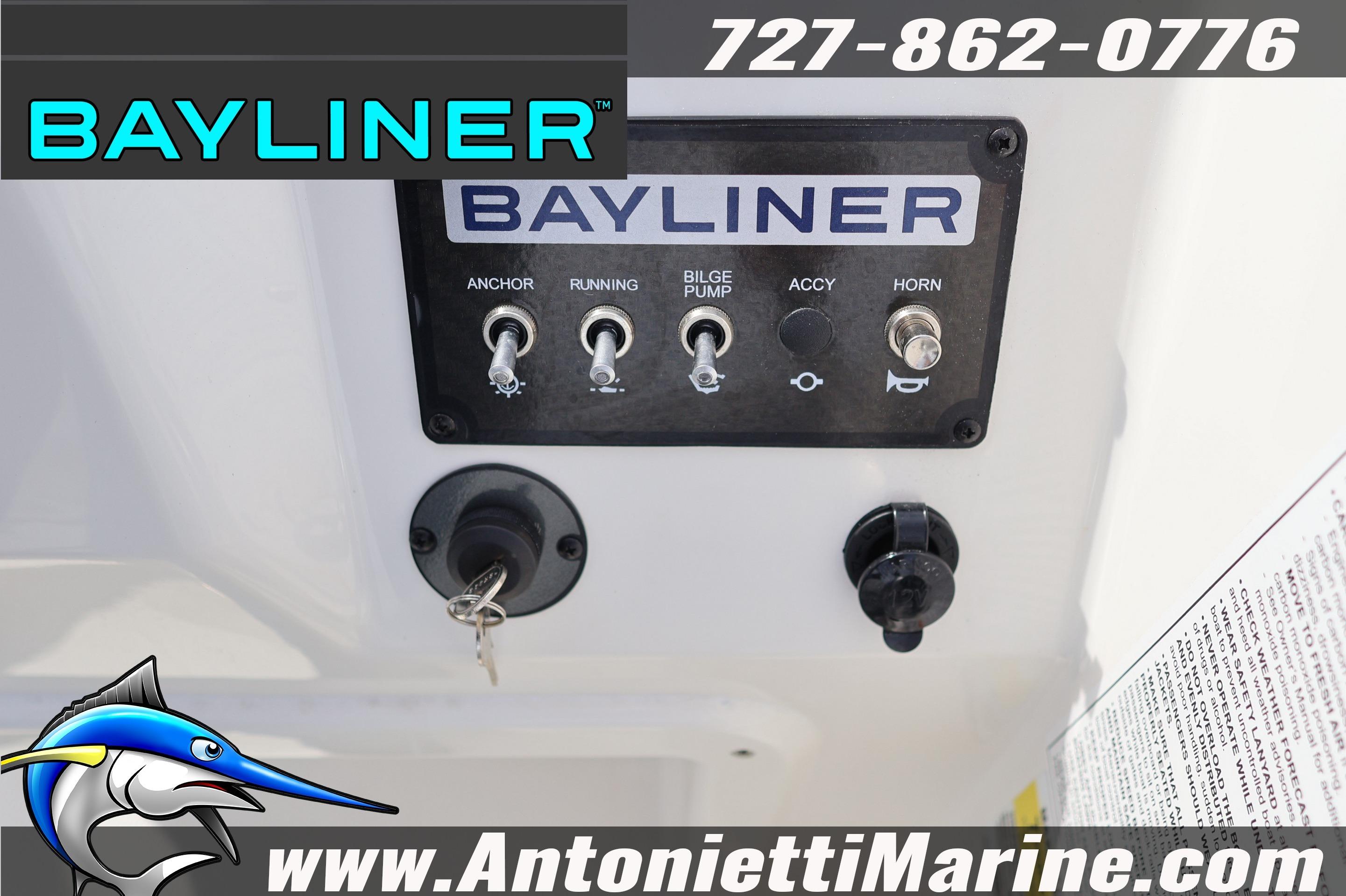 Control panel of 2026 Bayliner Element M17 boat with switches and key ignition.