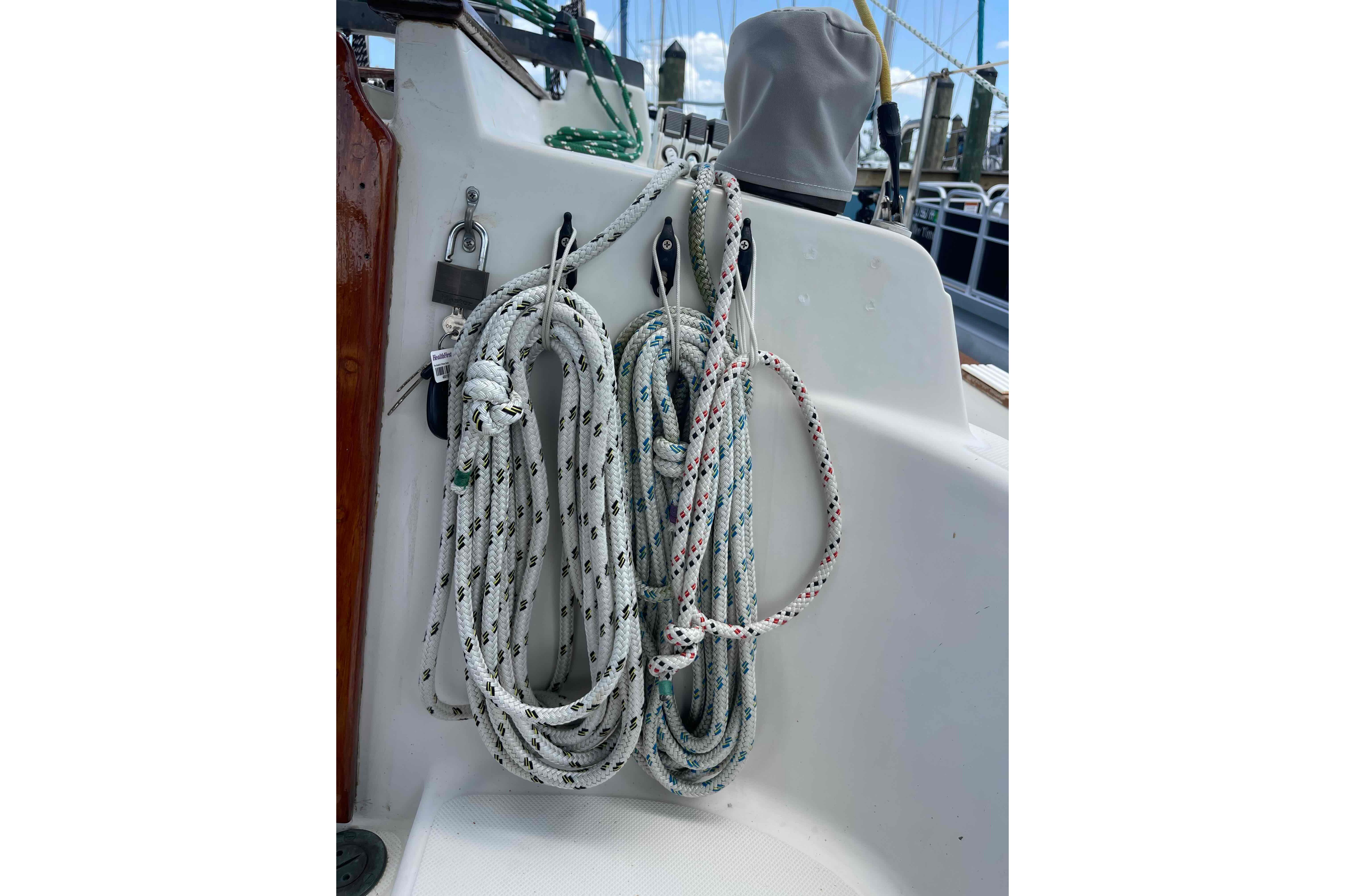 Coiled ropes on a 1987 Pacific Seacraft 34 sailboat deck.