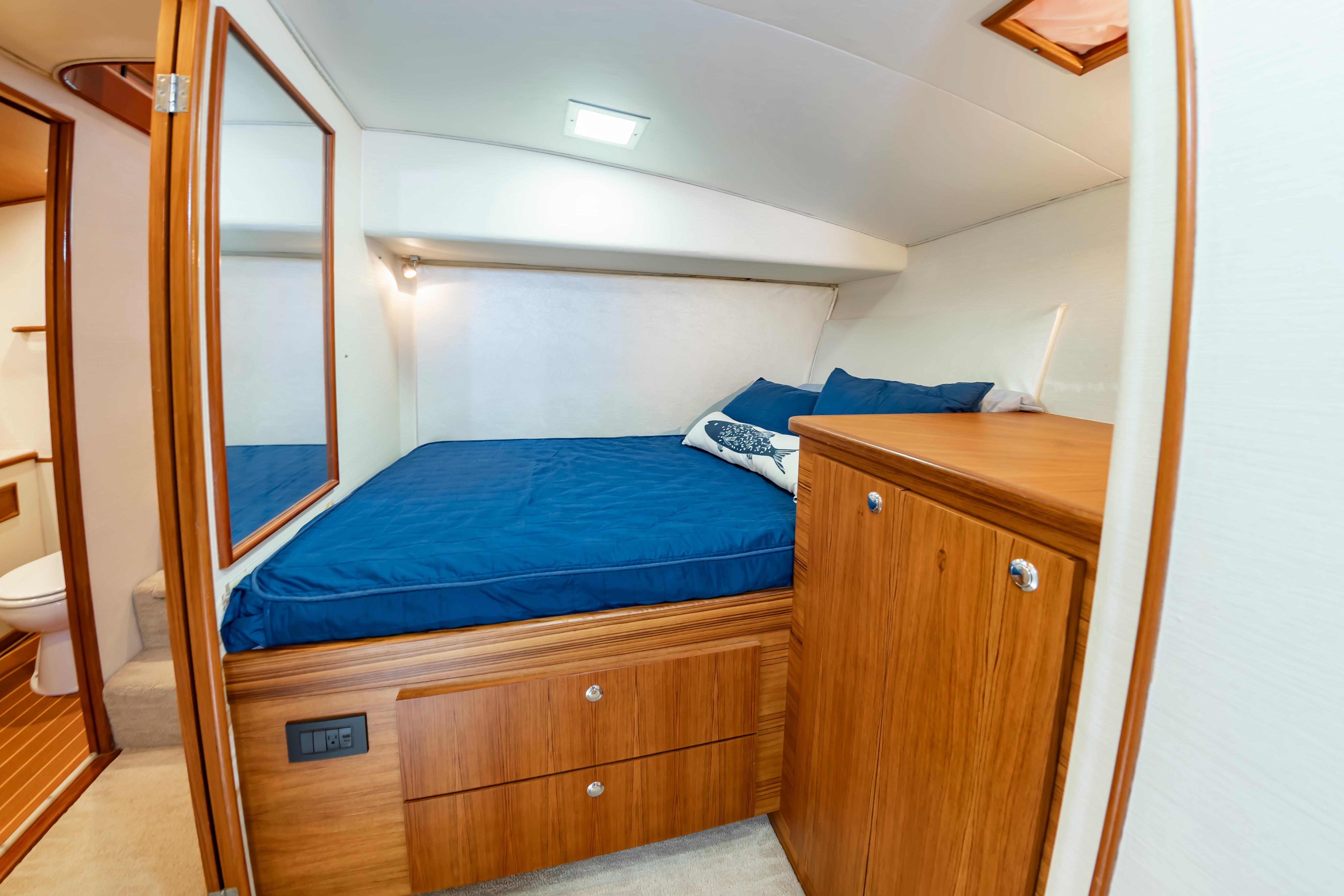 Luxurious cabin interior of 1993 Custom Carolina Scarborough 56 Convertible yacht.