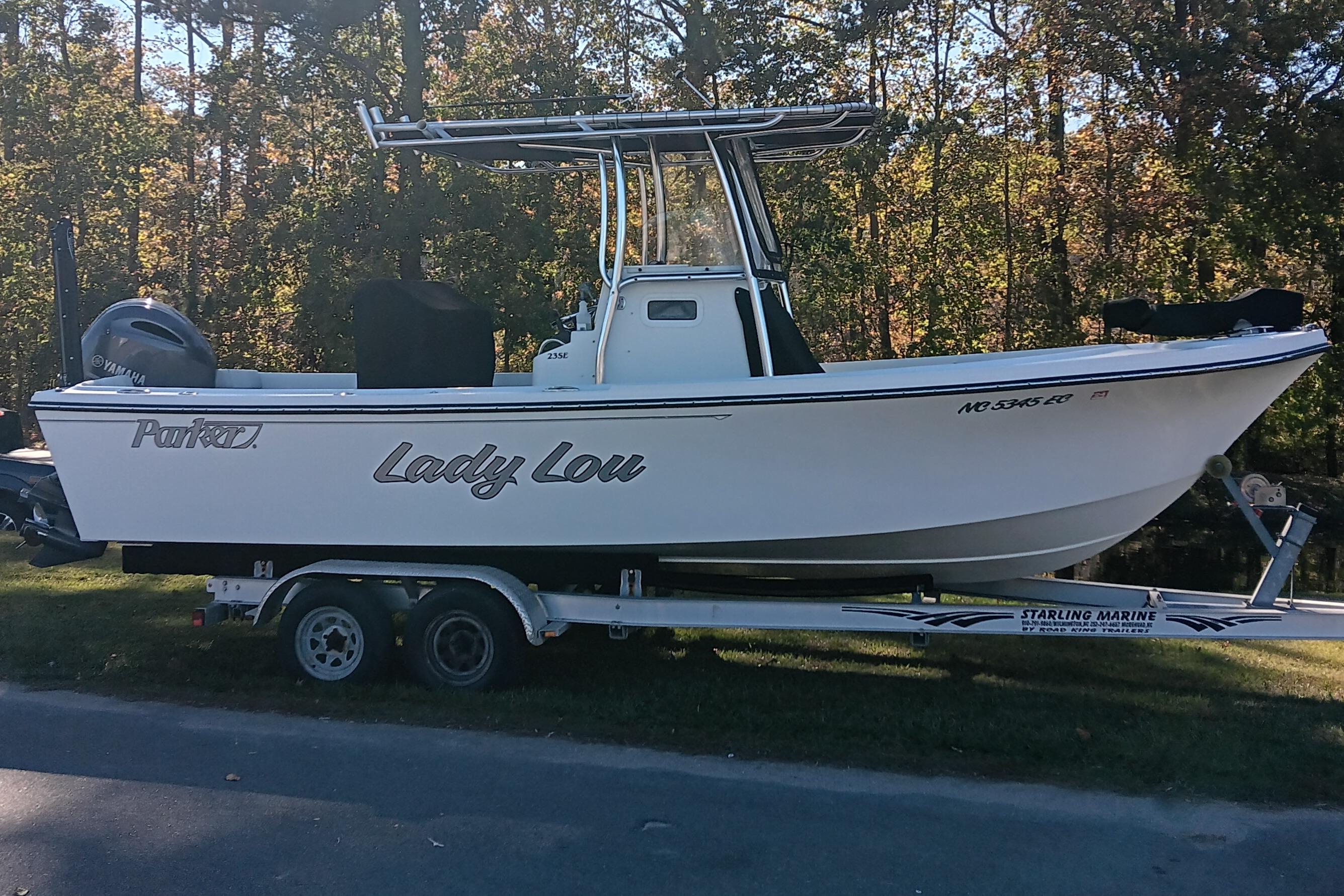 2016 Parker 2300 Special Edition boat on trailer, side view, outdoors.