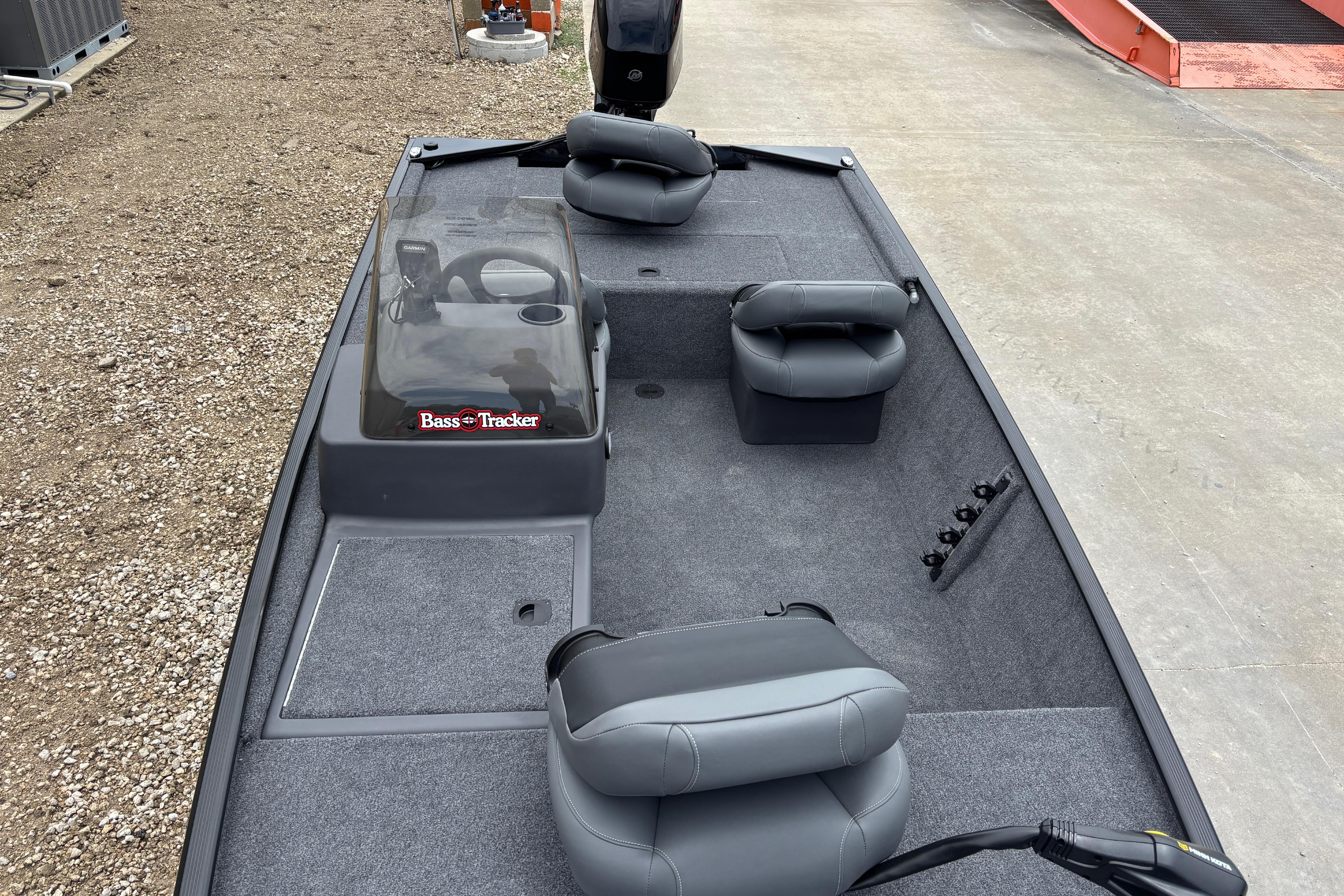 2026 Tracker Bass Tracker Classic XL boat interior with gray seating and steering console.