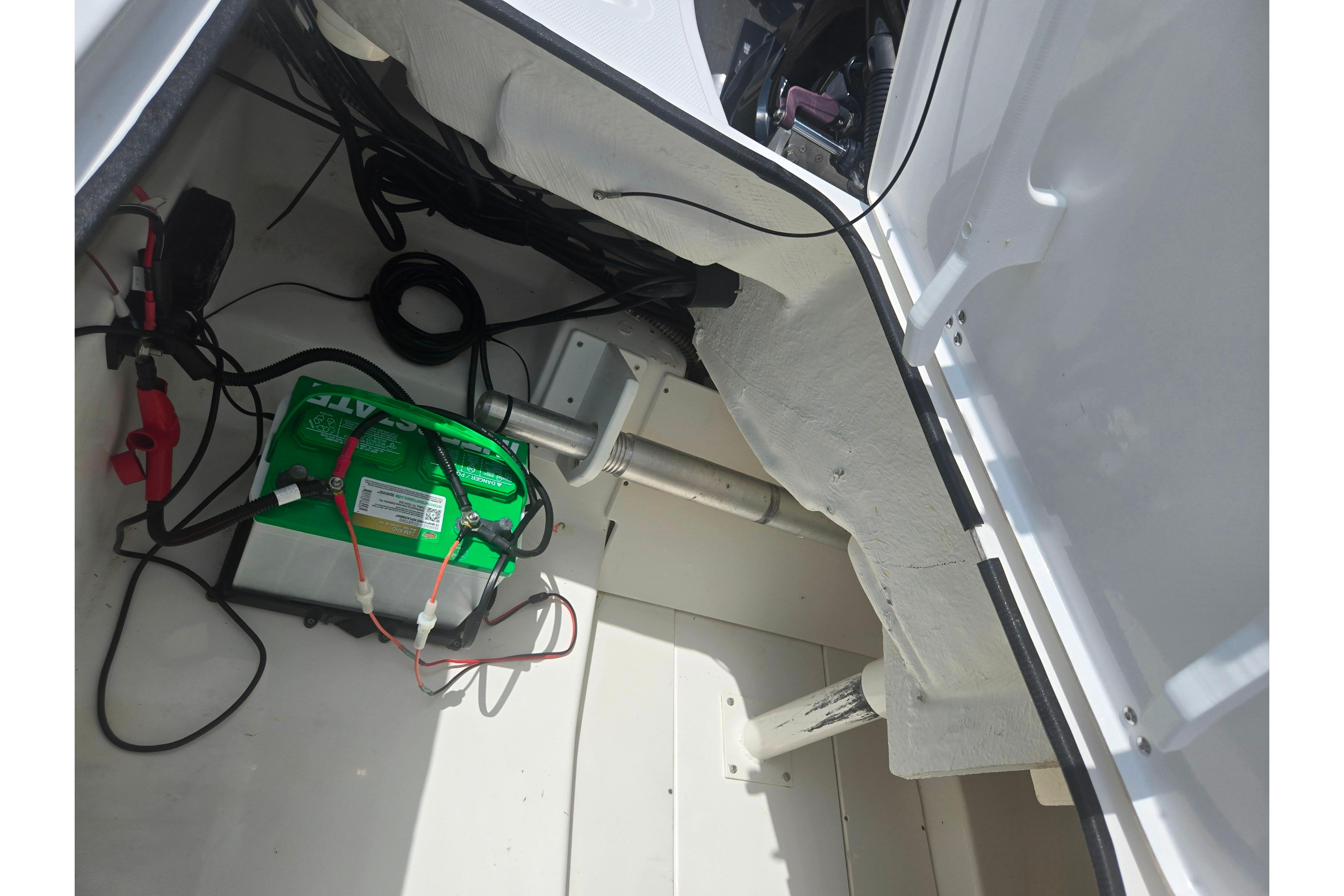 2023 Tahoe 200 S boat battery compartment with wiring and connections.