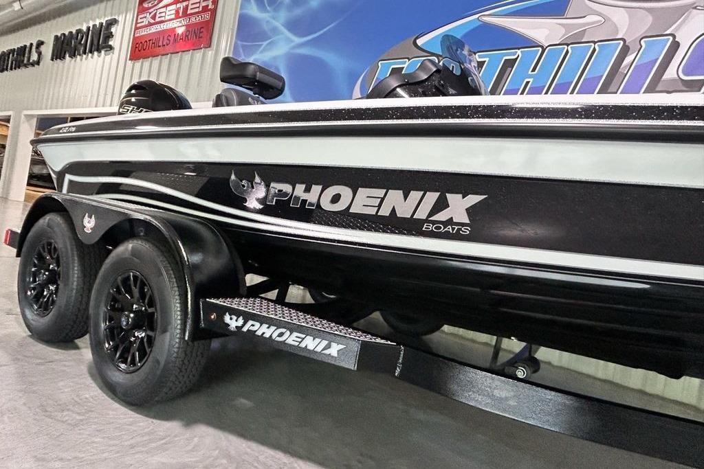 2026 Phoenix 818 Pro boat on trailer at Foothills Marine showroom.