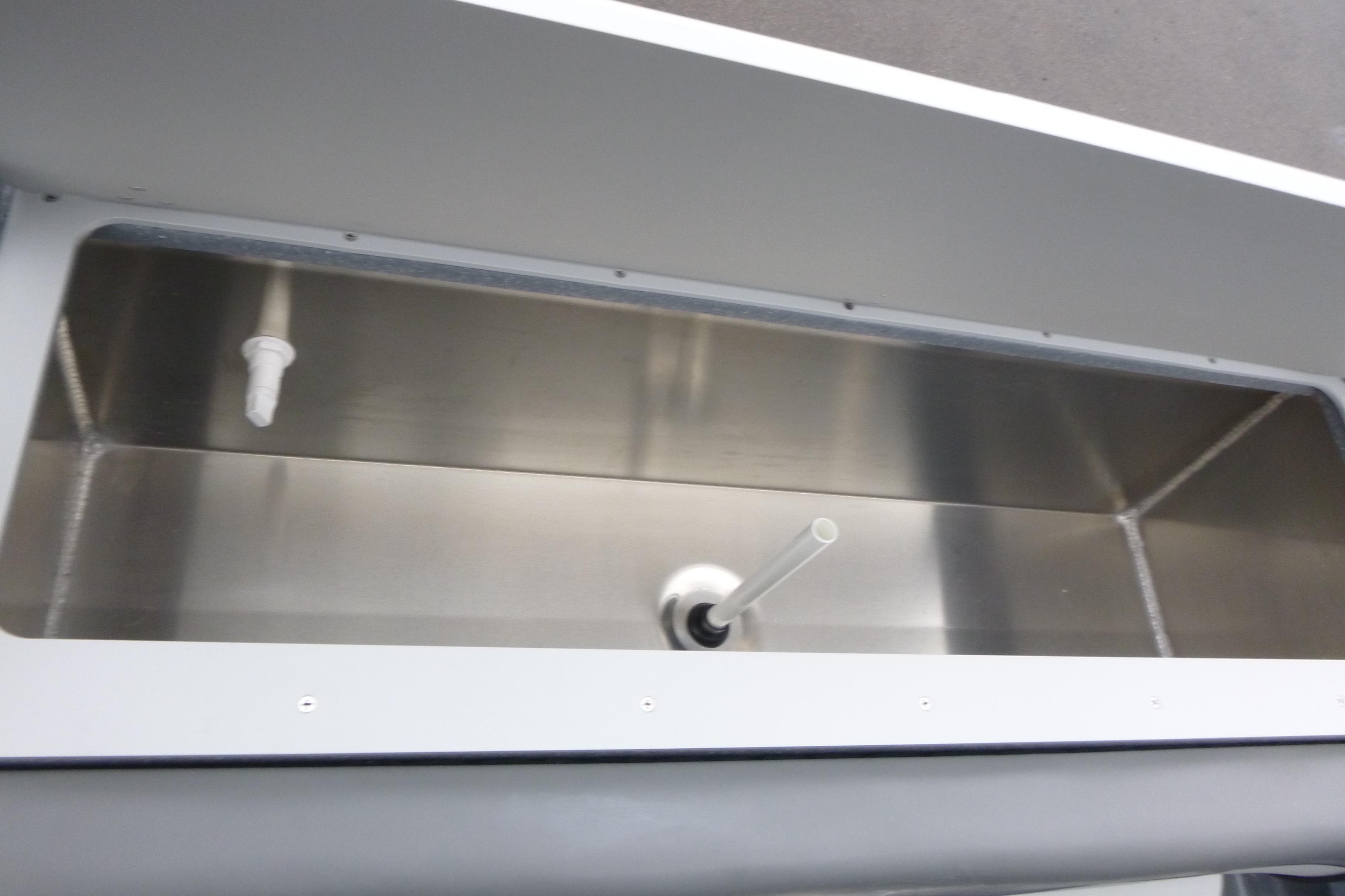 Stainless steel compartment in 2026 KingFisher 25 XAC boat.